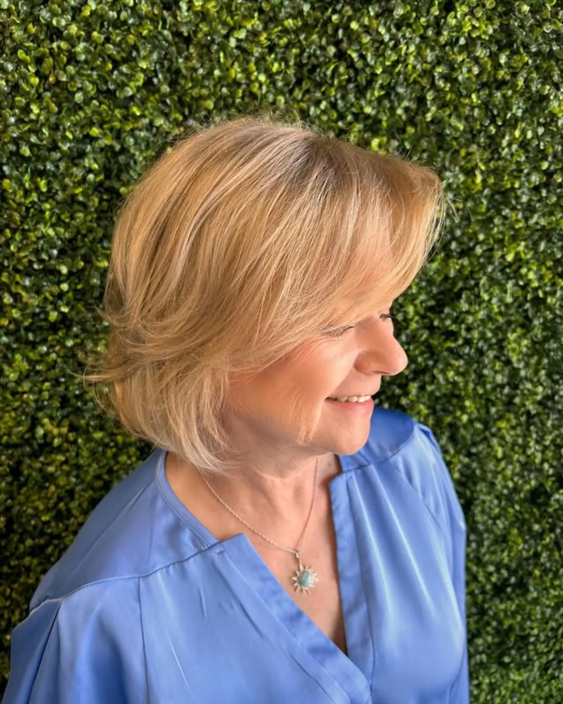 A classic layered bob with face-framing layers that enhance movement and volume. 1