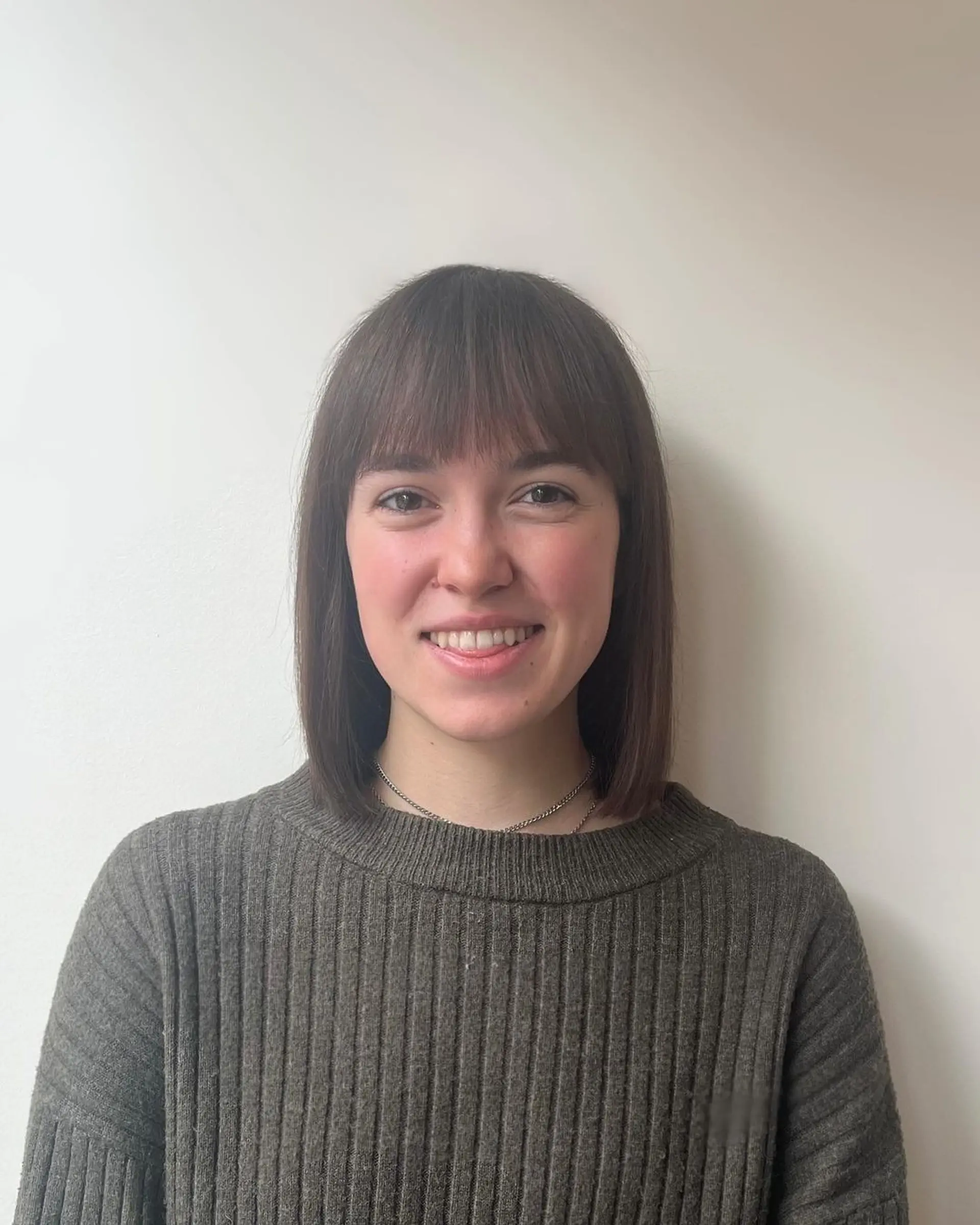 Medium-length, straight bob with a clean, blunt cut and a smooth, natural fringe. 2