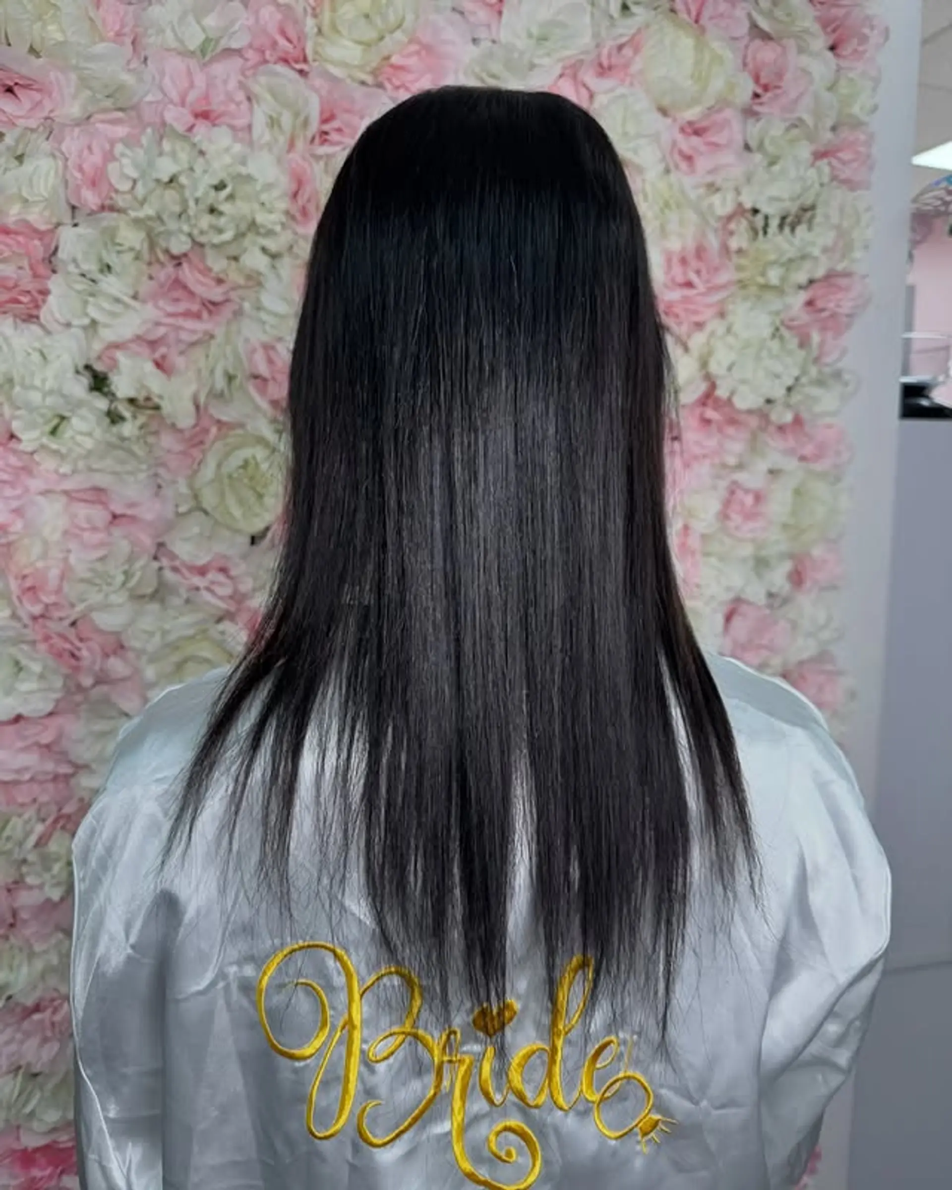 Sleek, straight, long hairstyle. 1