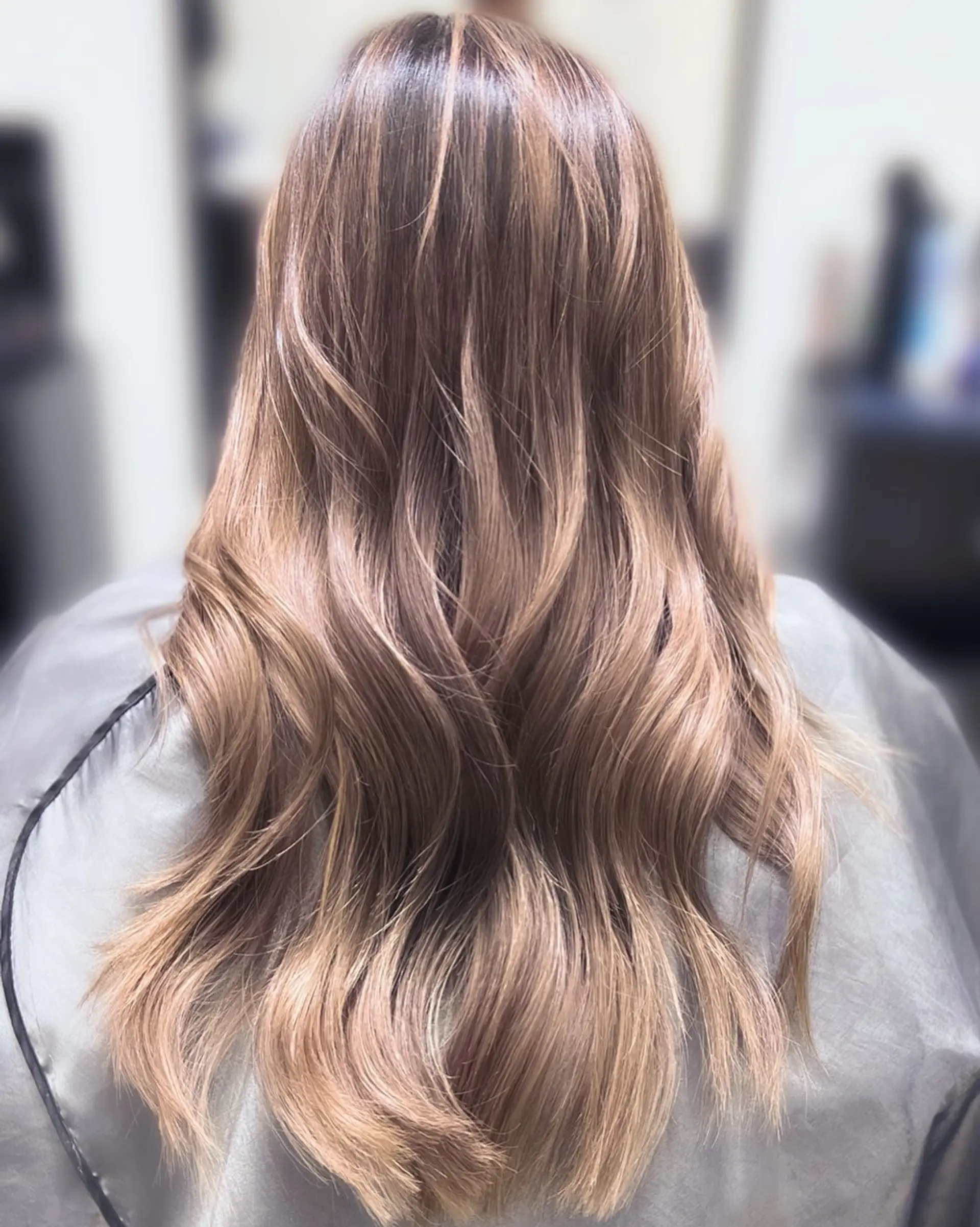 Long, flowing beach waves with a bronde balayage. 1