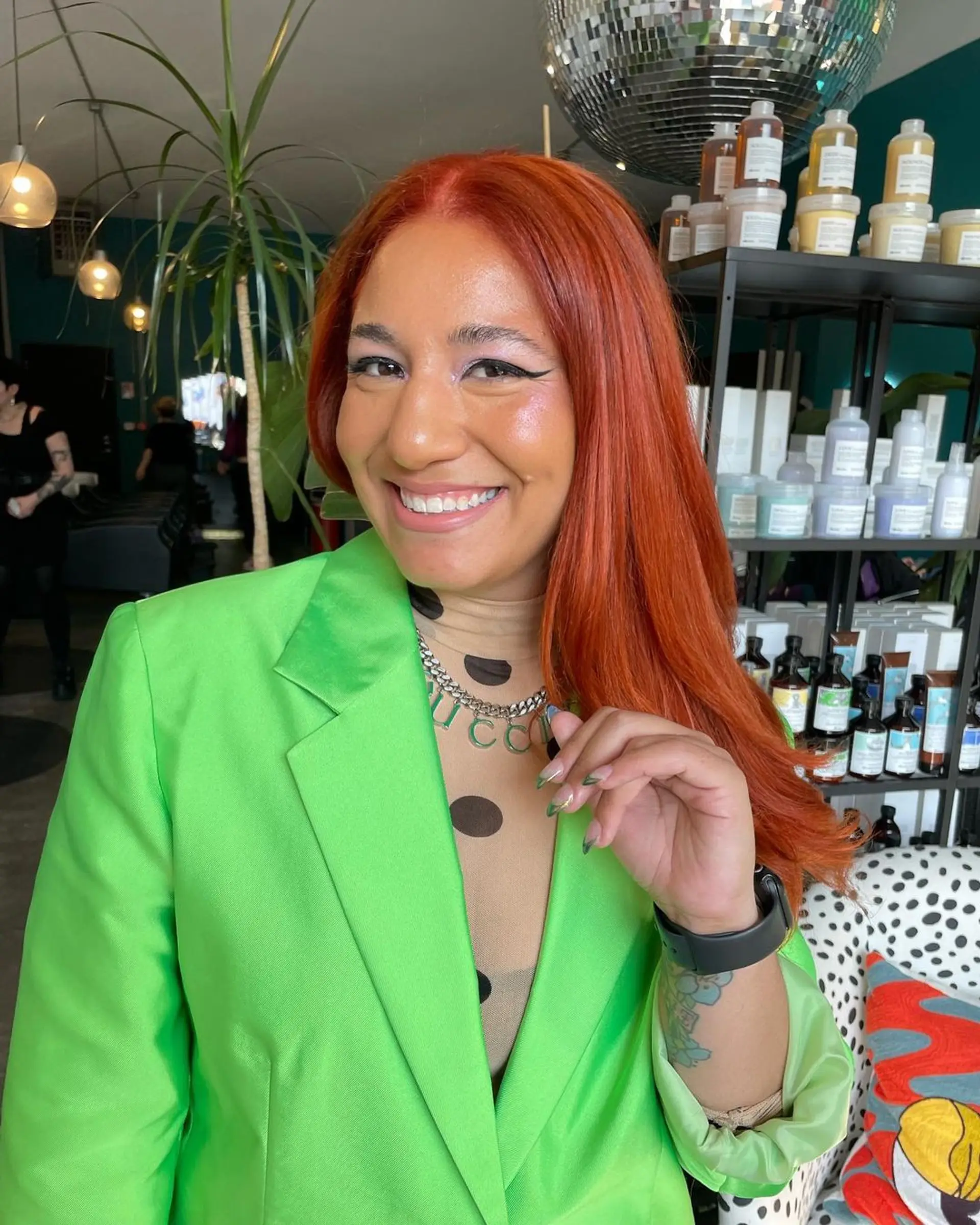 Long, straight copper hair with a subtle side part and smooth texture. Paired with a beautiful full glam! 1