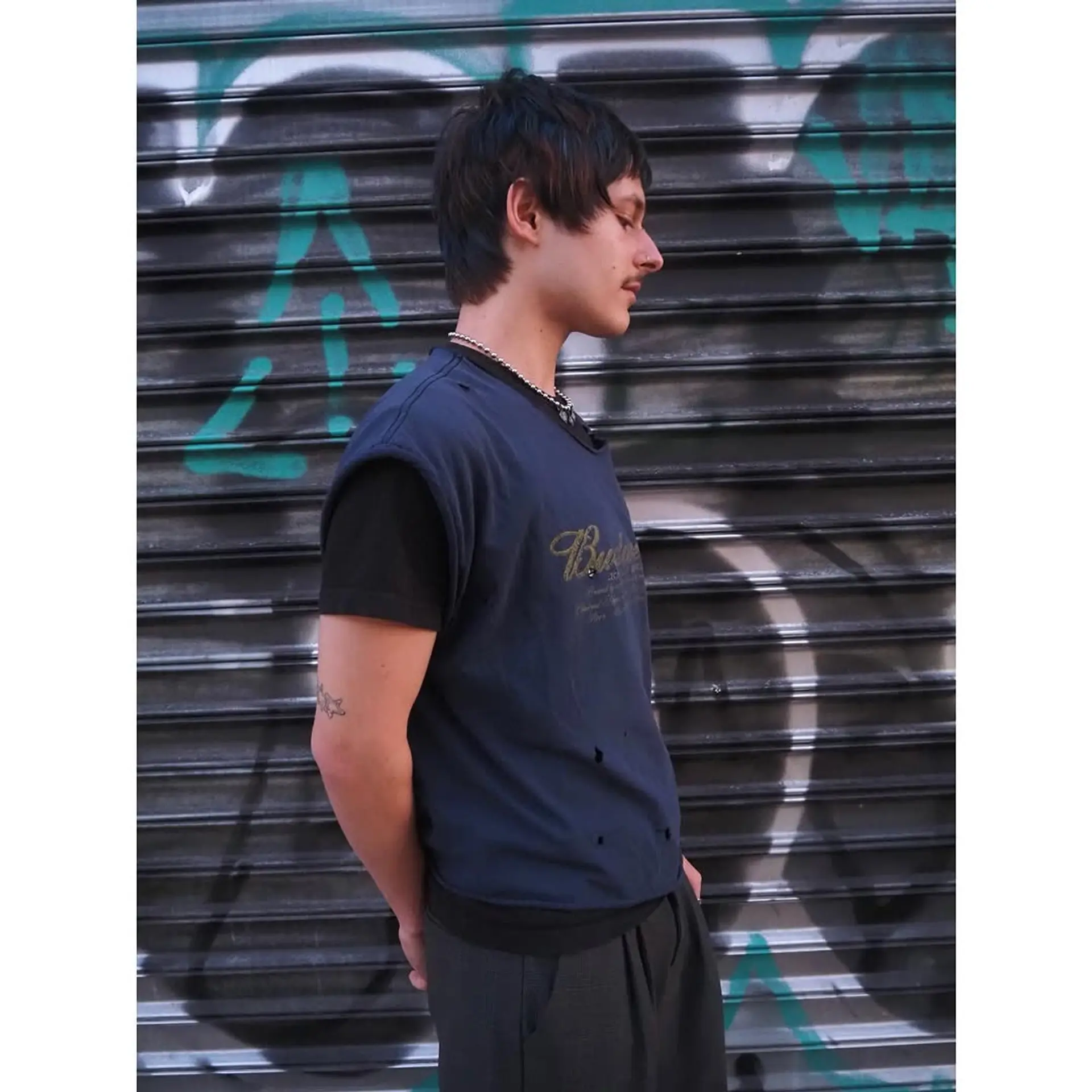 A modern shag with textured layers and curtain bangs. 1