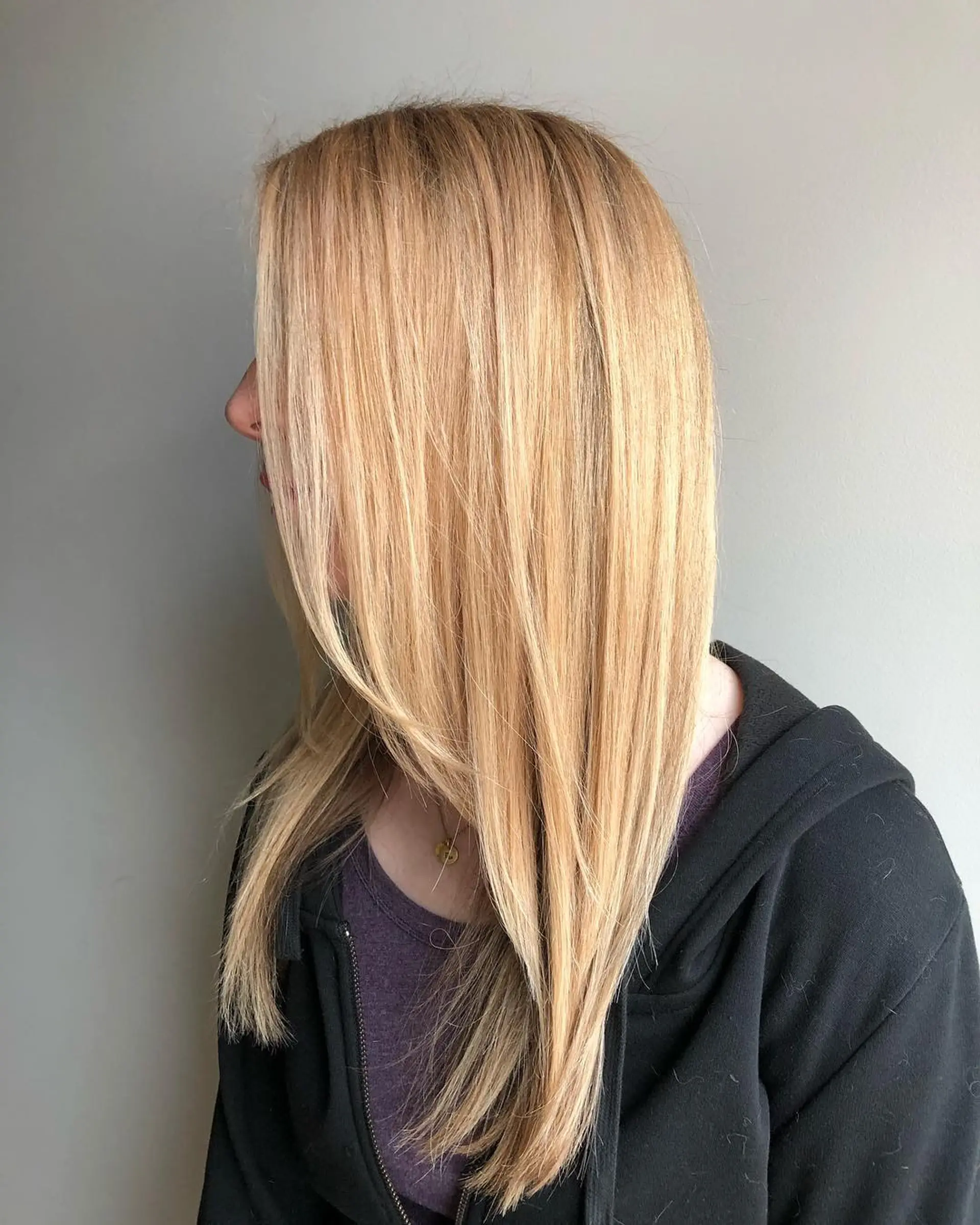 Long straight hair with subtle layers and honey blonde balayage. 1