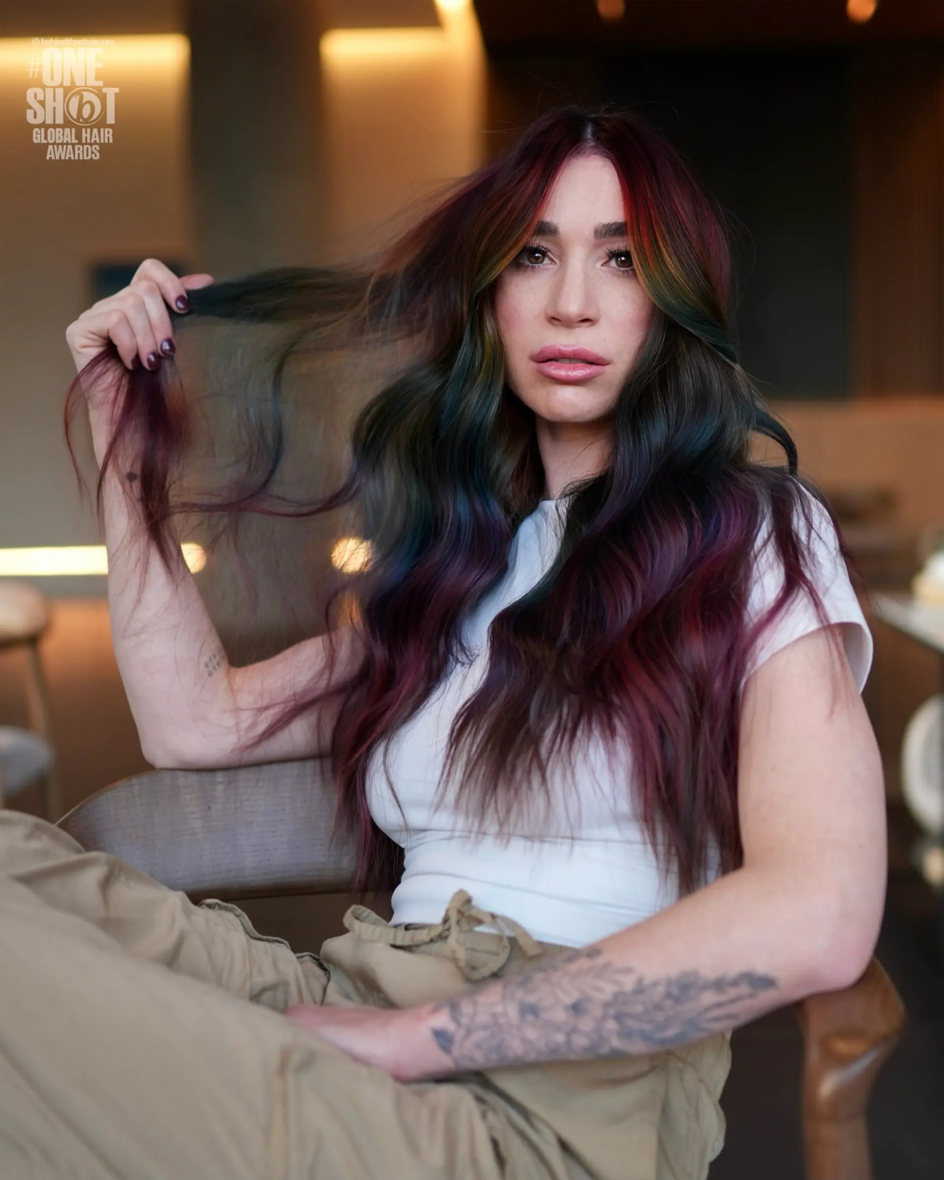 Long, flowing wavy hair combining a deep obsidian base with vivid tones of red, purple, blue, and green. 1