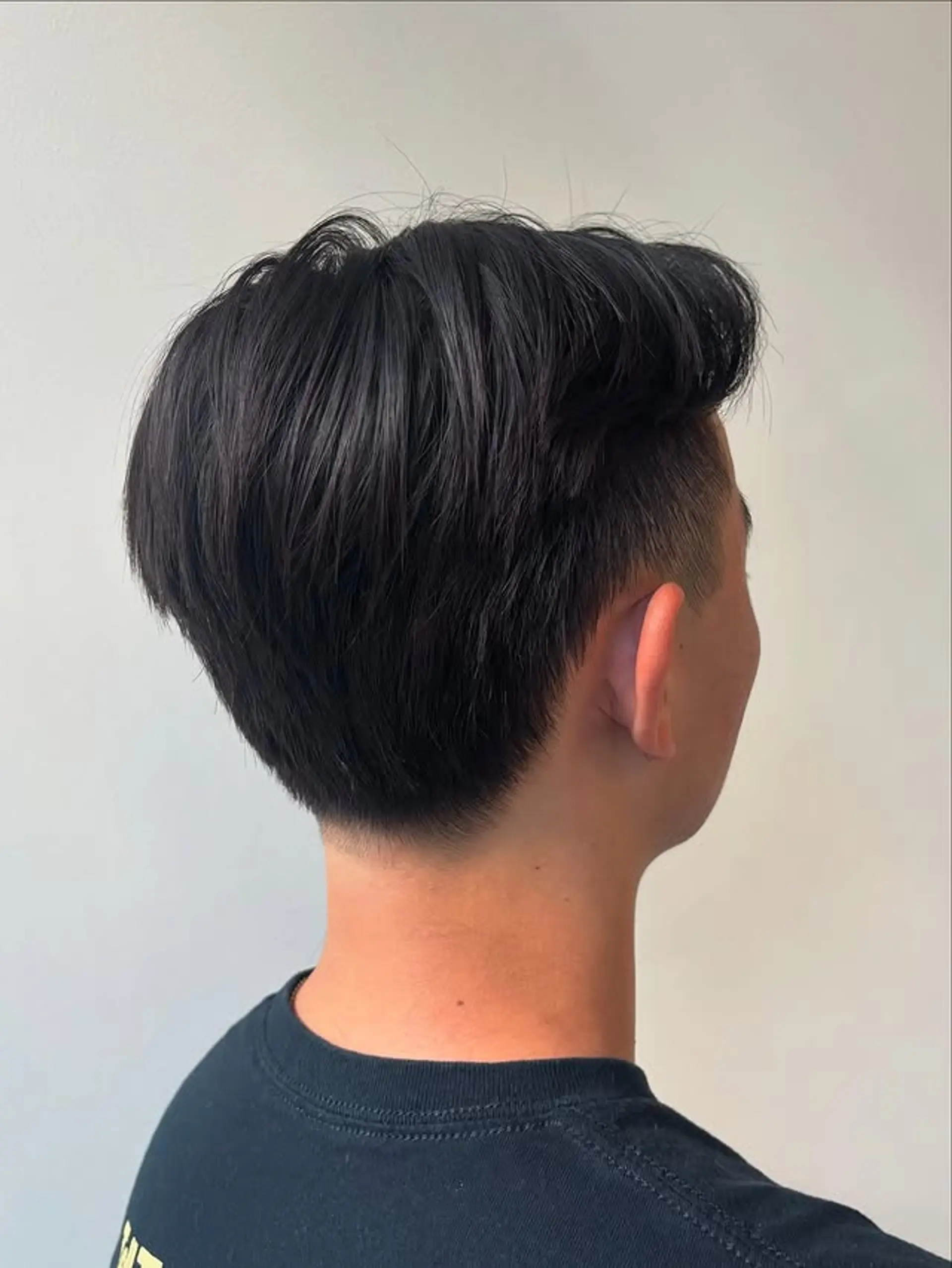 A taper fade with a textured top. 1