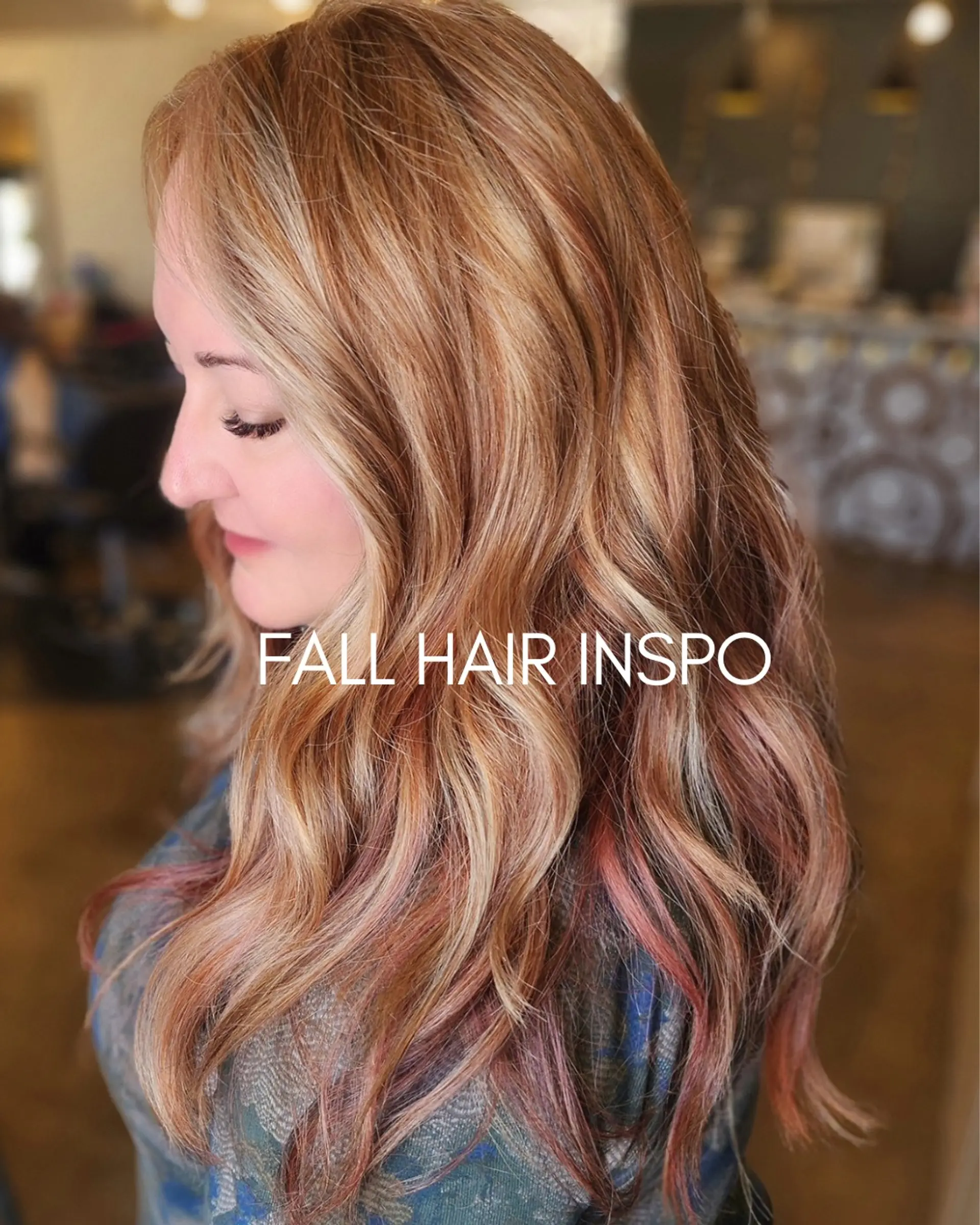 Long cascading waves featuring a dimensional blend of warm copper, blonde highlights, and subtle rose undertones. 1