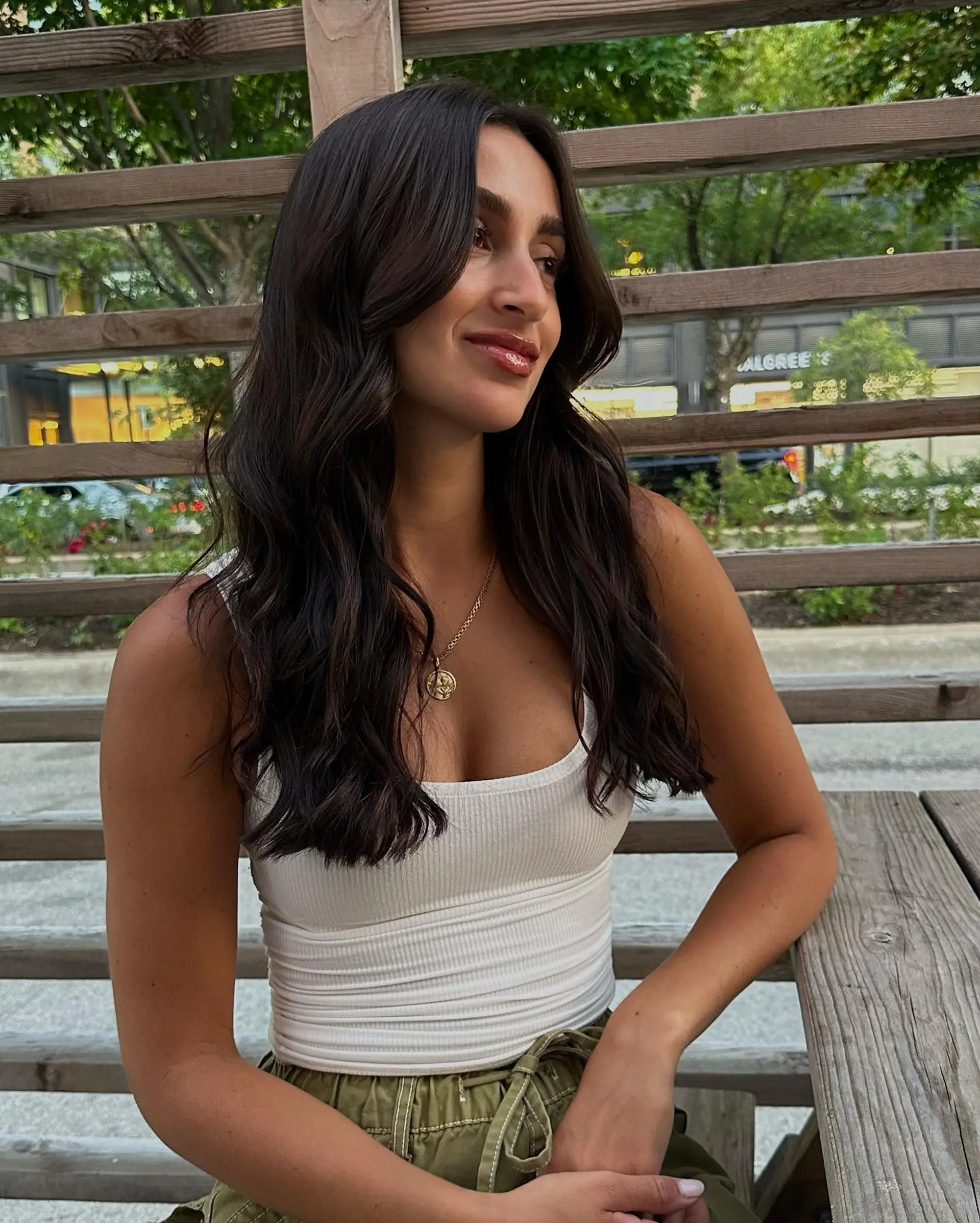 Long, wavy hair with subtle layering for added movement. 1