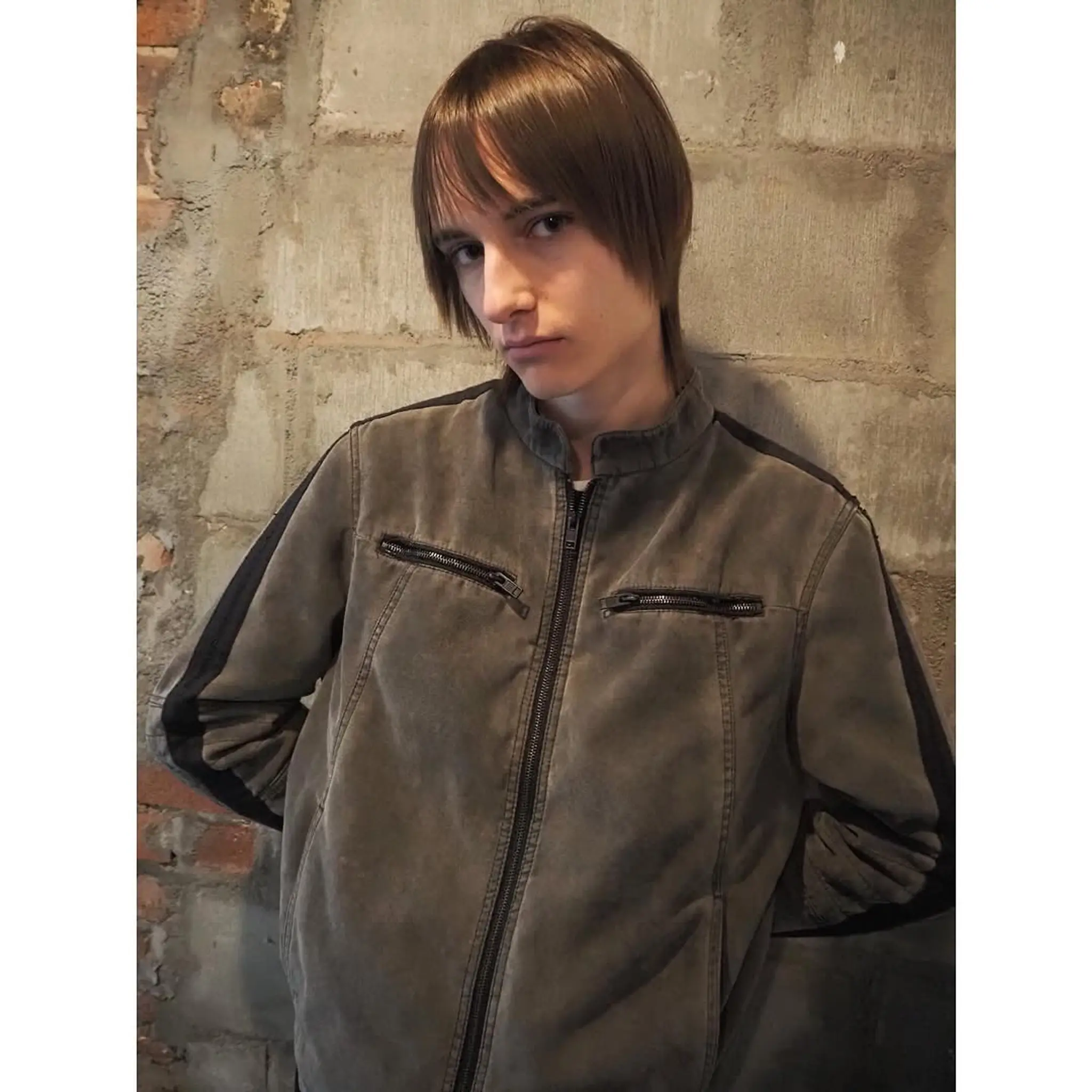 A sleek, medium-length bob with a full fringe.