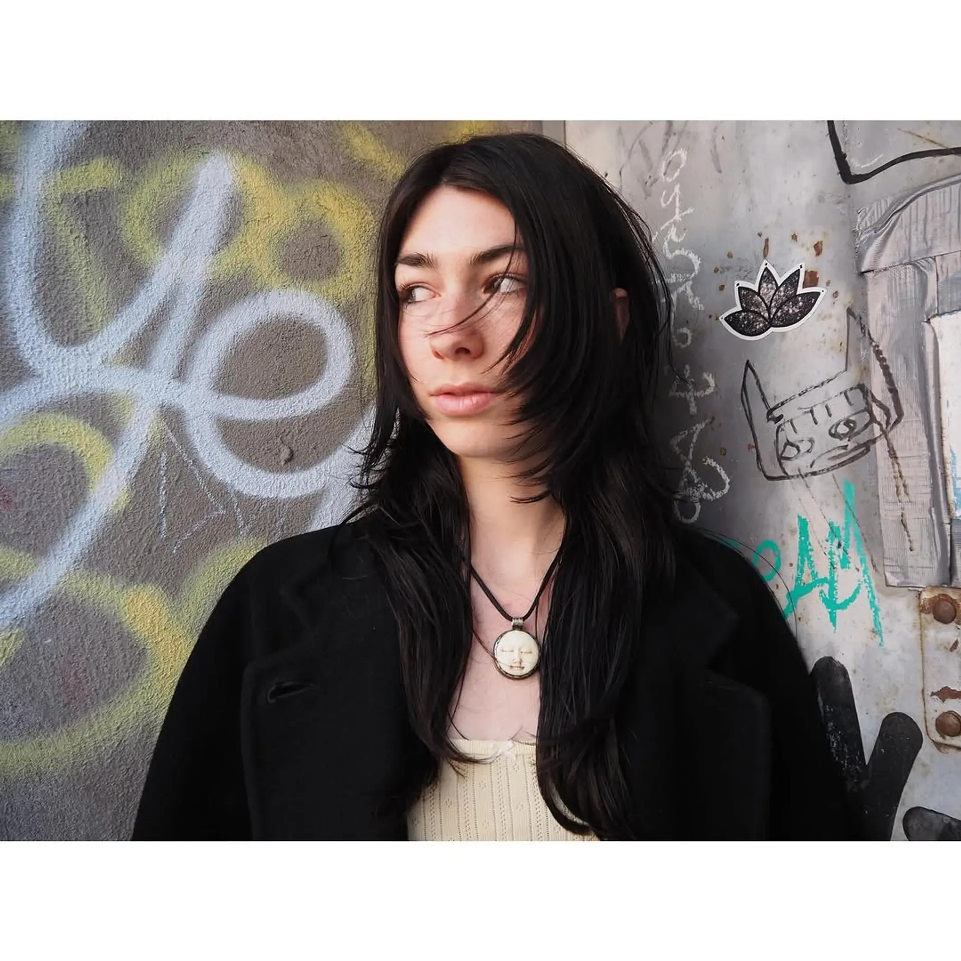 A trendy shag haircut with distinct face-framing layers for a textured and modern appearance. 2