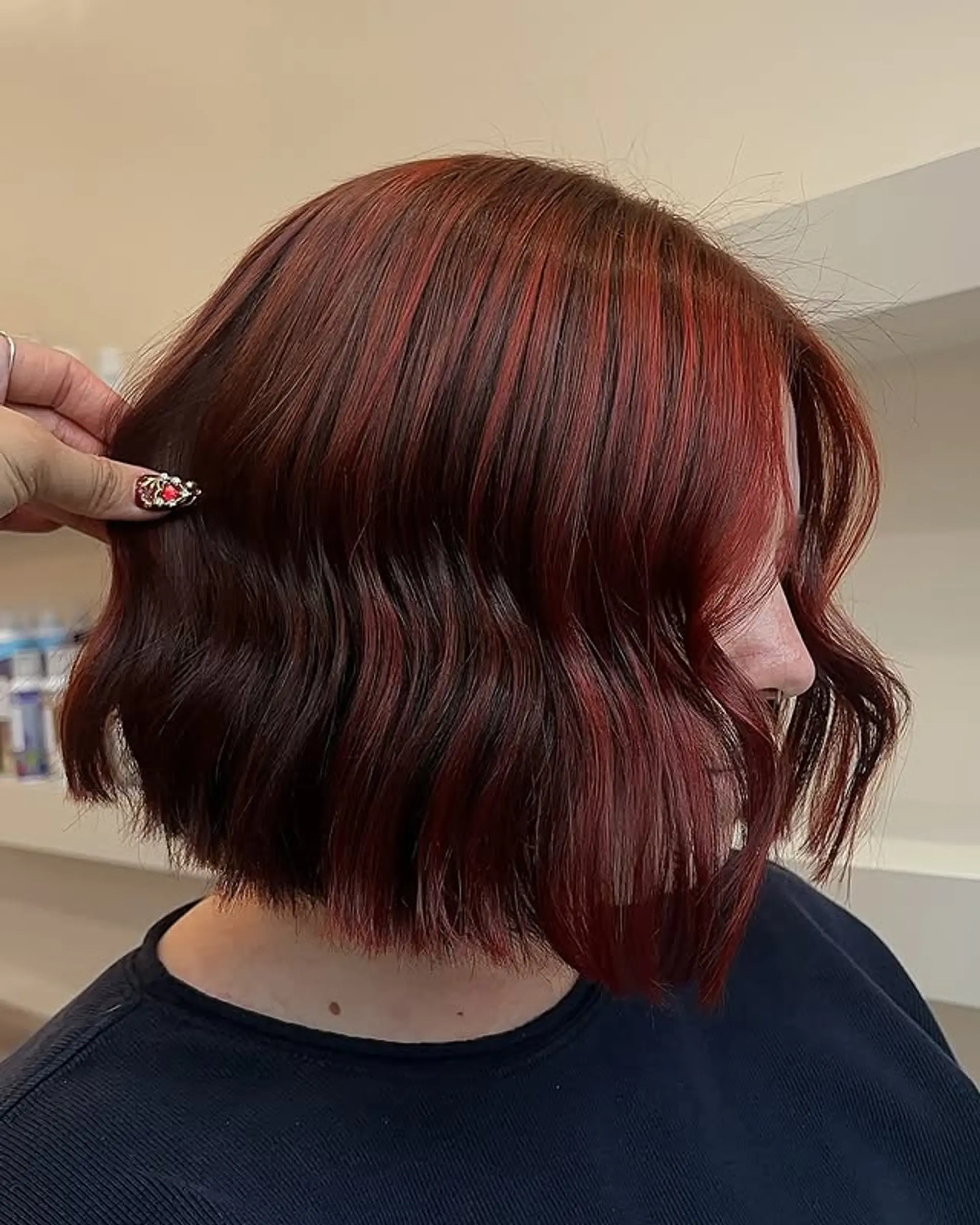 A wavy, shoulder-length bob with soft layers. 1