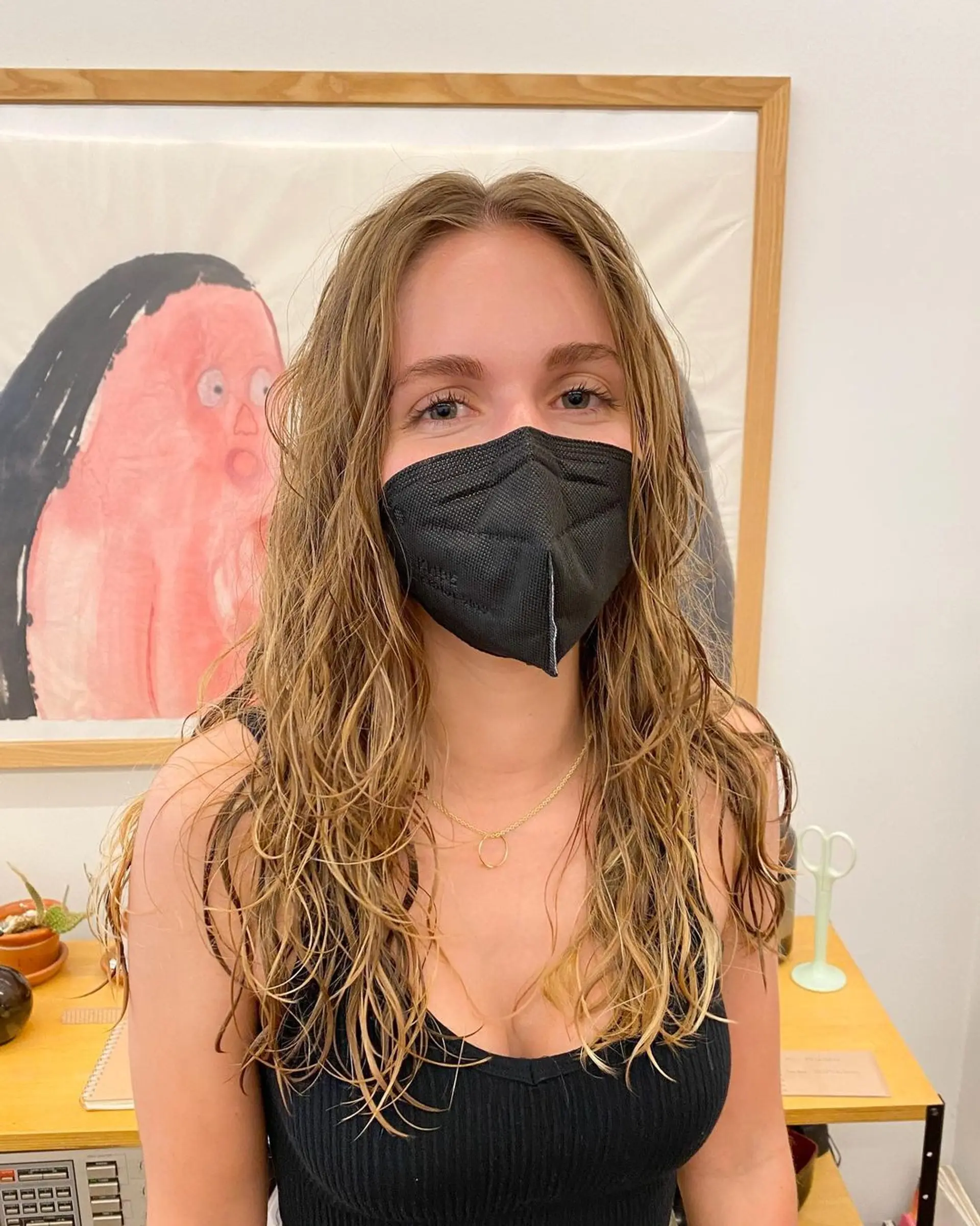 Wavy long hair with natural waves and softly textured ends, giving a casual and beachy look. 1