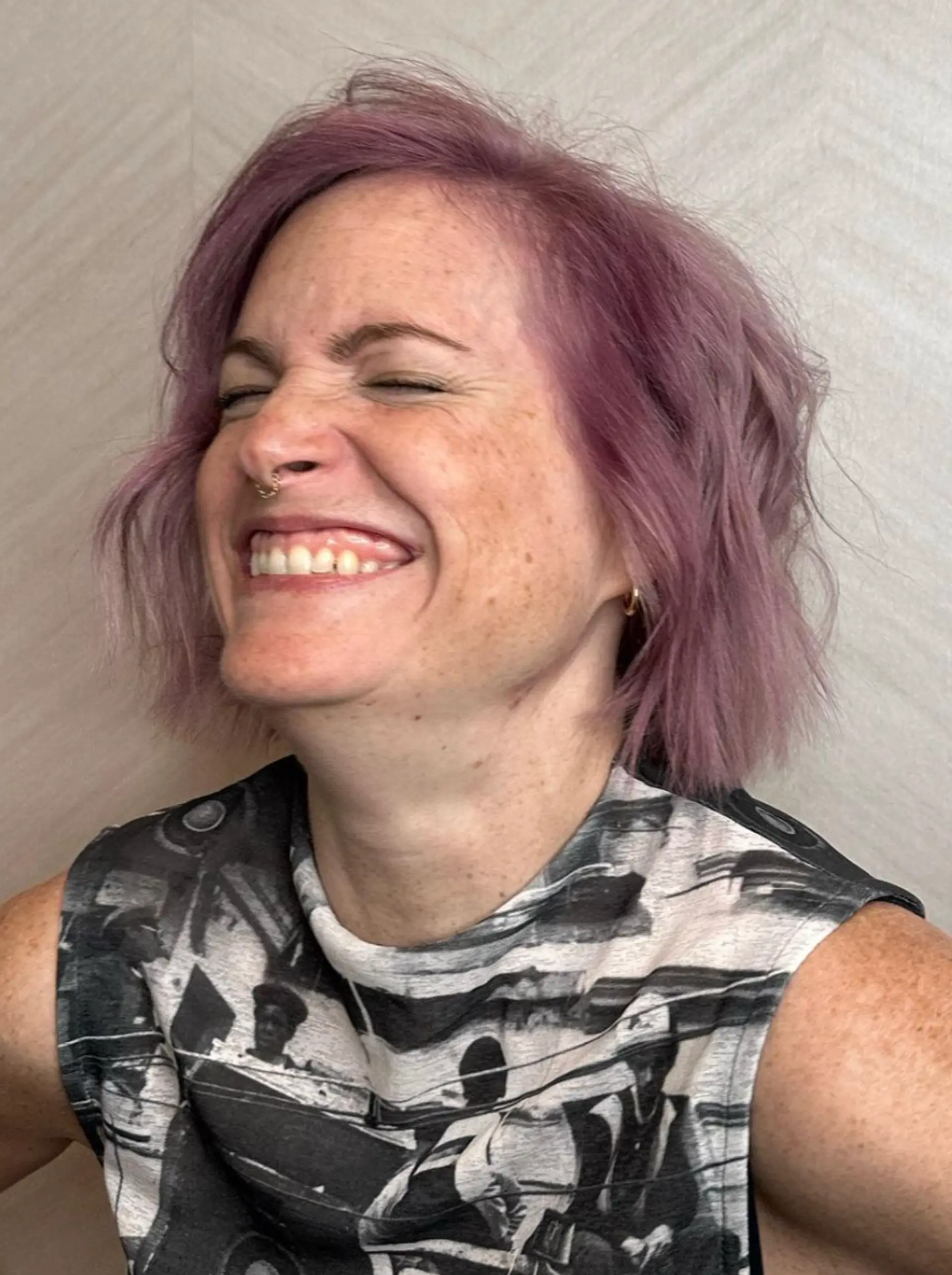 A short, textured bob with wavy, pastel lavender and pink hair that adds movement and depth. The overall style is chic and fashion-forward, featuring layers that enhance volume and visual interest.

Color by @simabeautynyc
Cut and style by @juliamannino_hair
 3