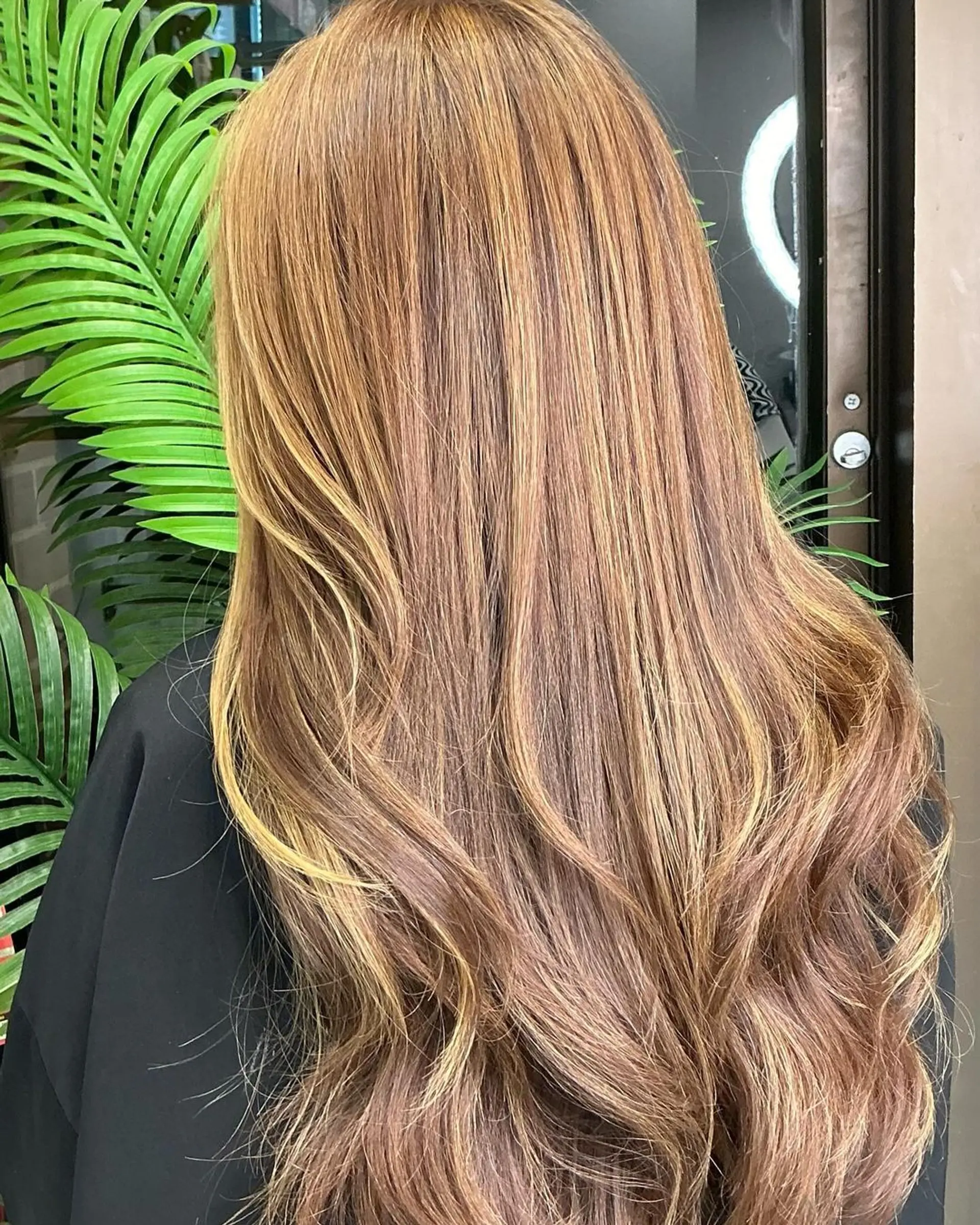 Very long wavy hair featuring bronze, honey blonde, and golden brown hues with a cascading effect. 1