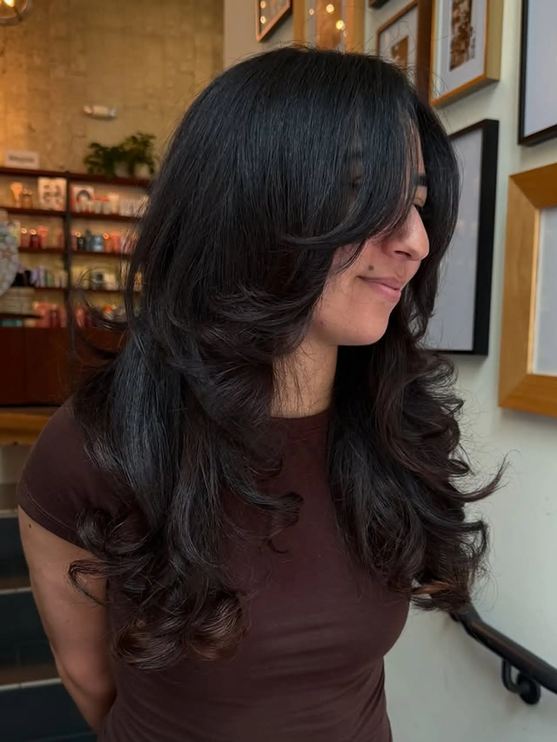 Long layered haircut with curtain bangs 1