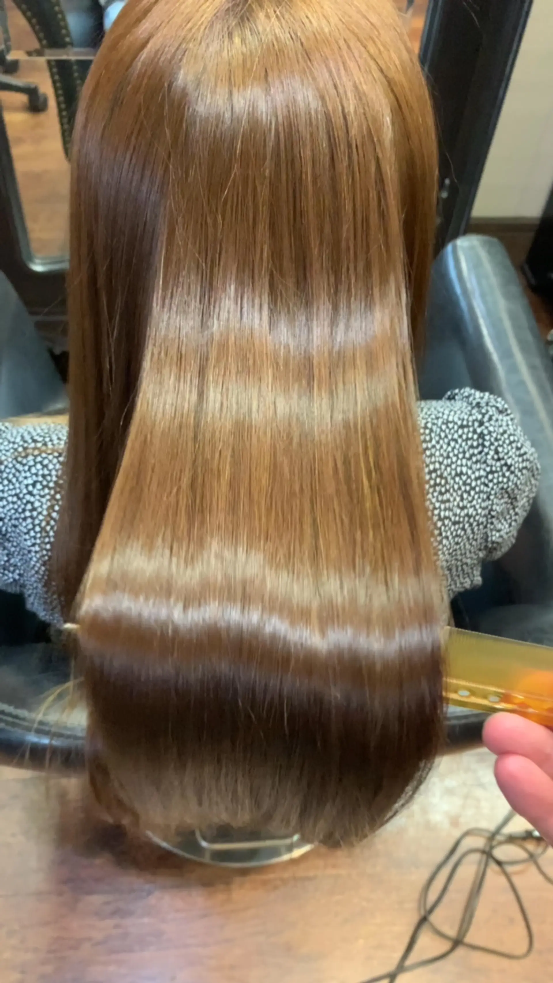 Ultra-glossy, sleek, and smooth straight light brown hair displaying vibrant shine. 1
