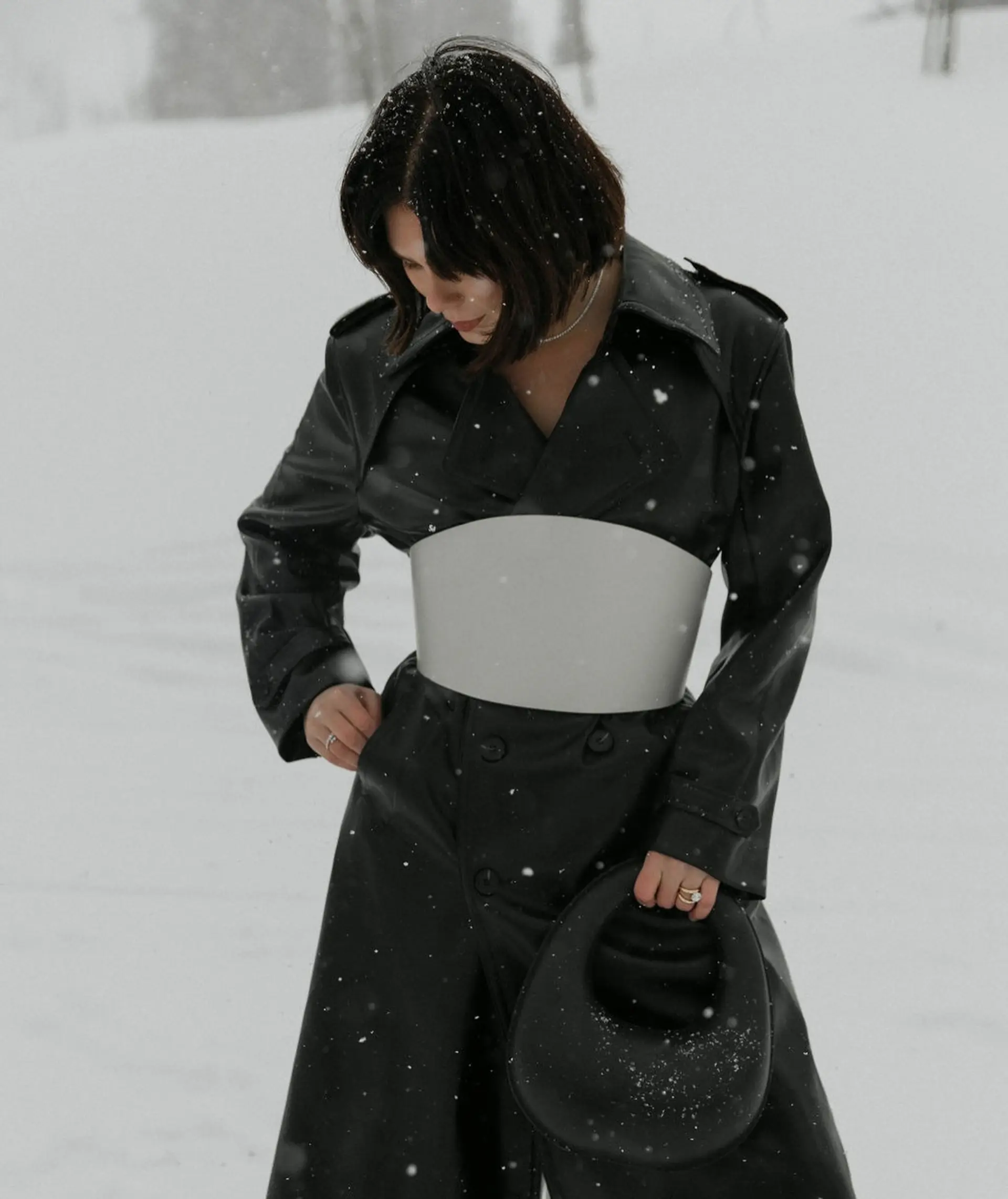 A chin-length dark brunette bob cut with soft razor texture and face-framing pieces. 1