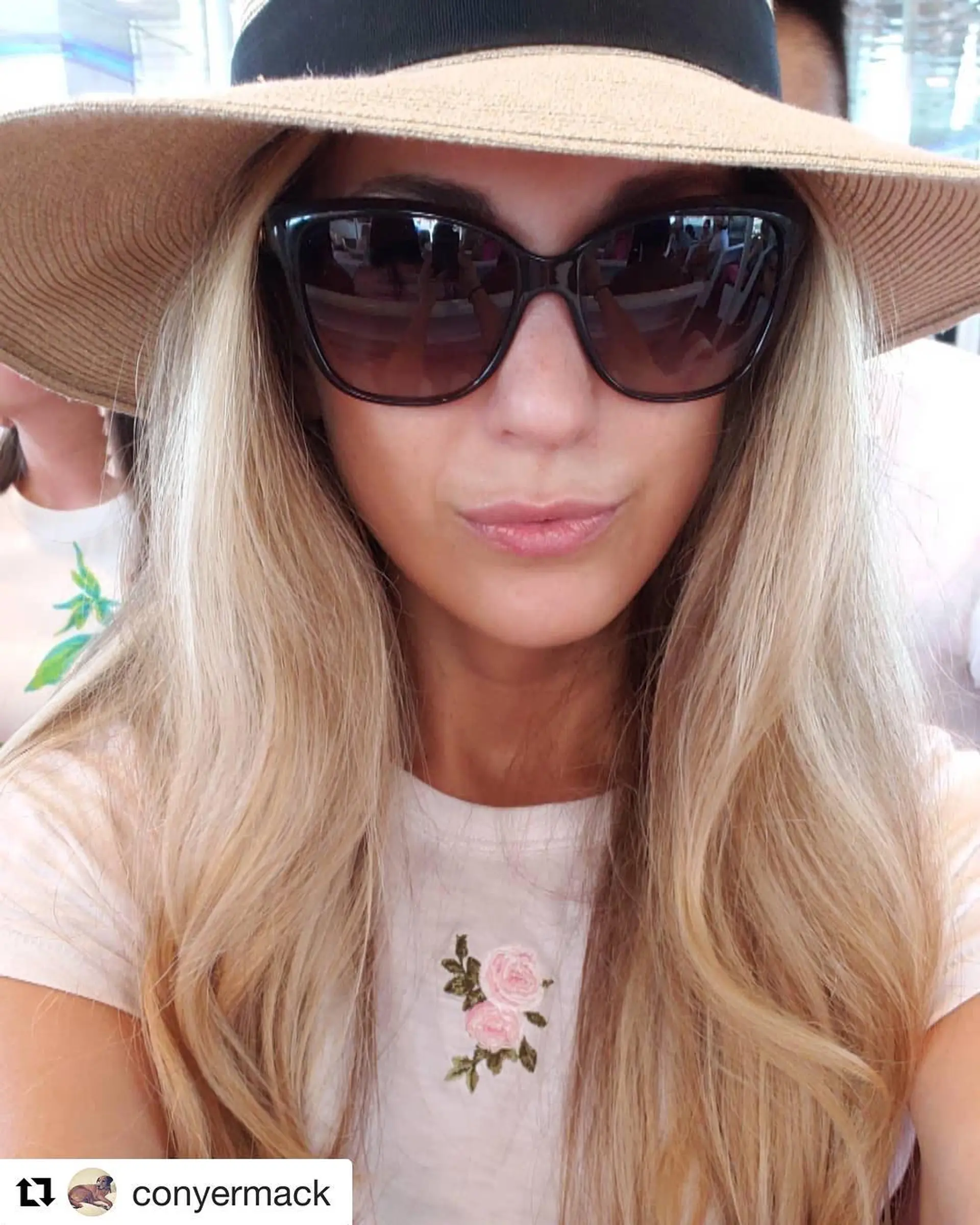 Long blonde hair styled in soft, natural waves flowing over the shoulders. 1