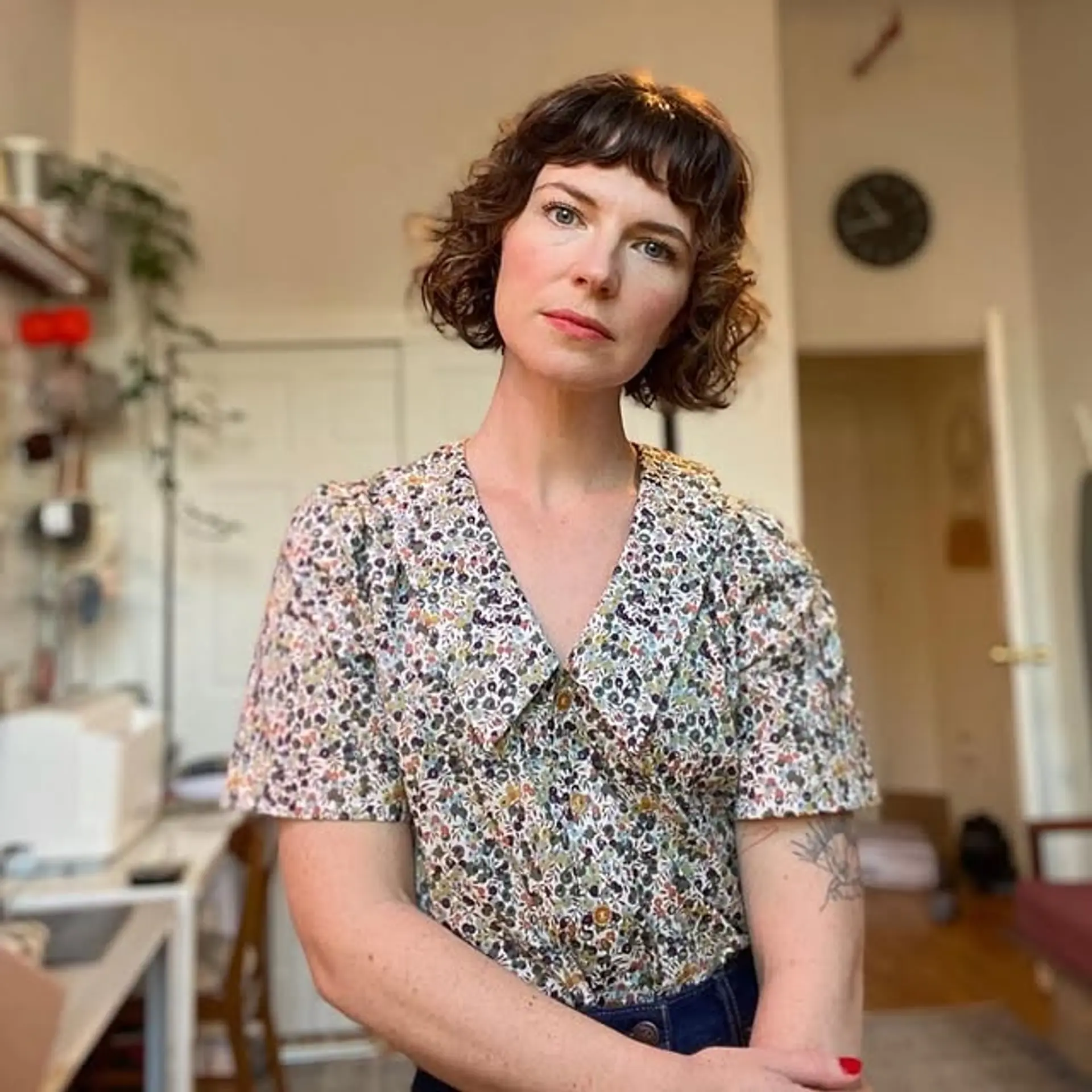 A curly shag with natural texture and curtain bangs. 1