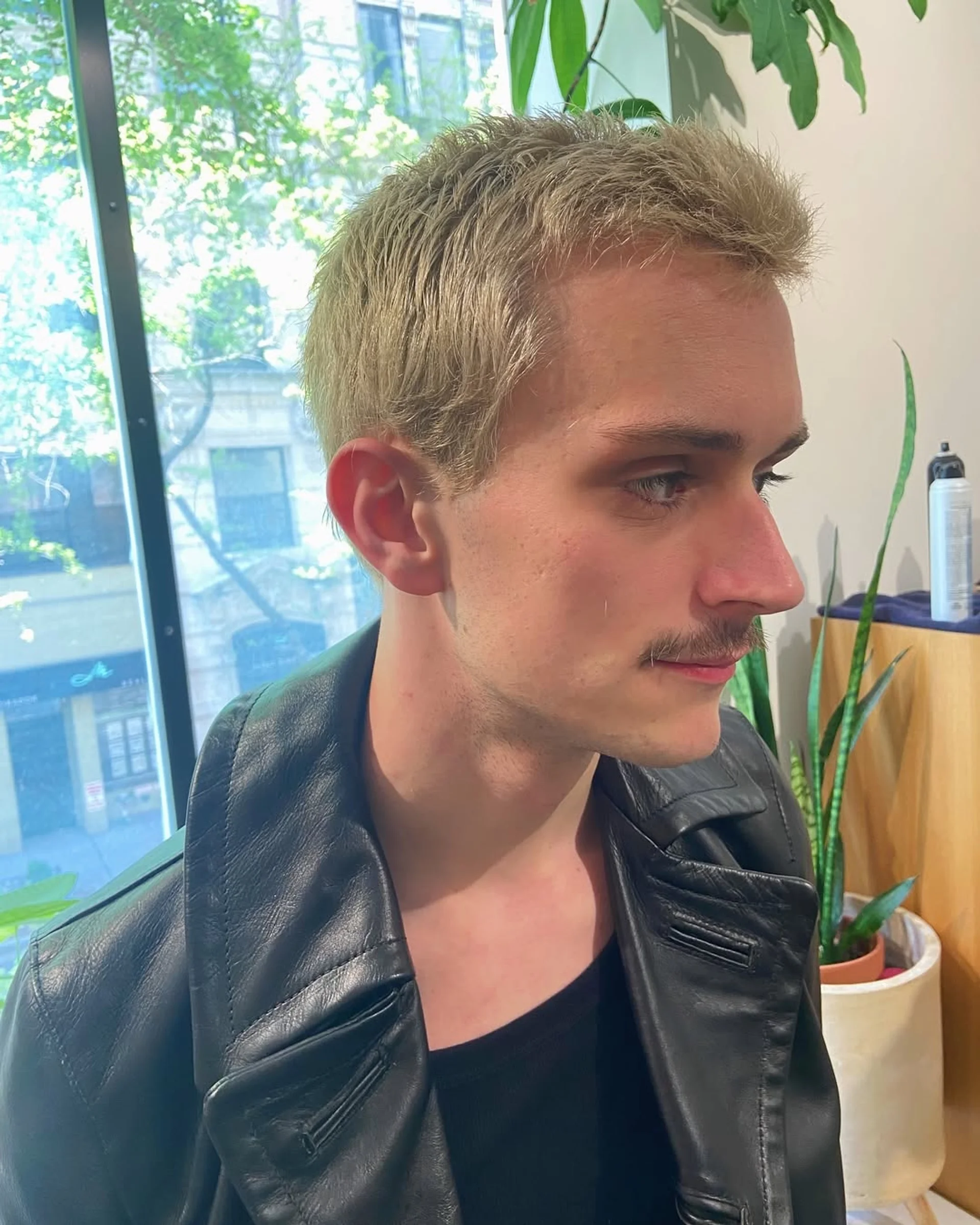 A modern textured buzz cut with tapered sides showcasing the early grown-out phase - Preview 2
