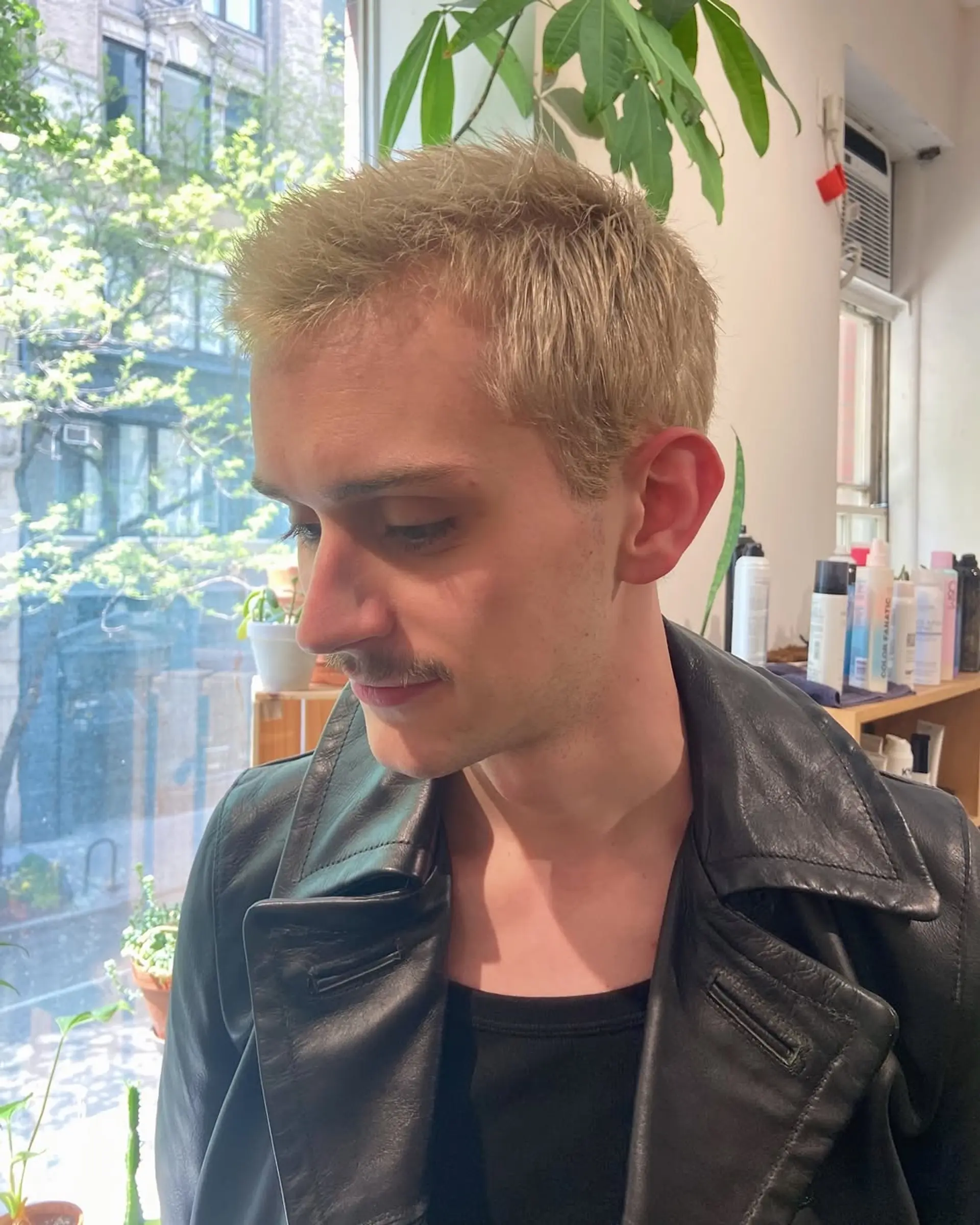 A stylish buzz cut with a textured top. 2