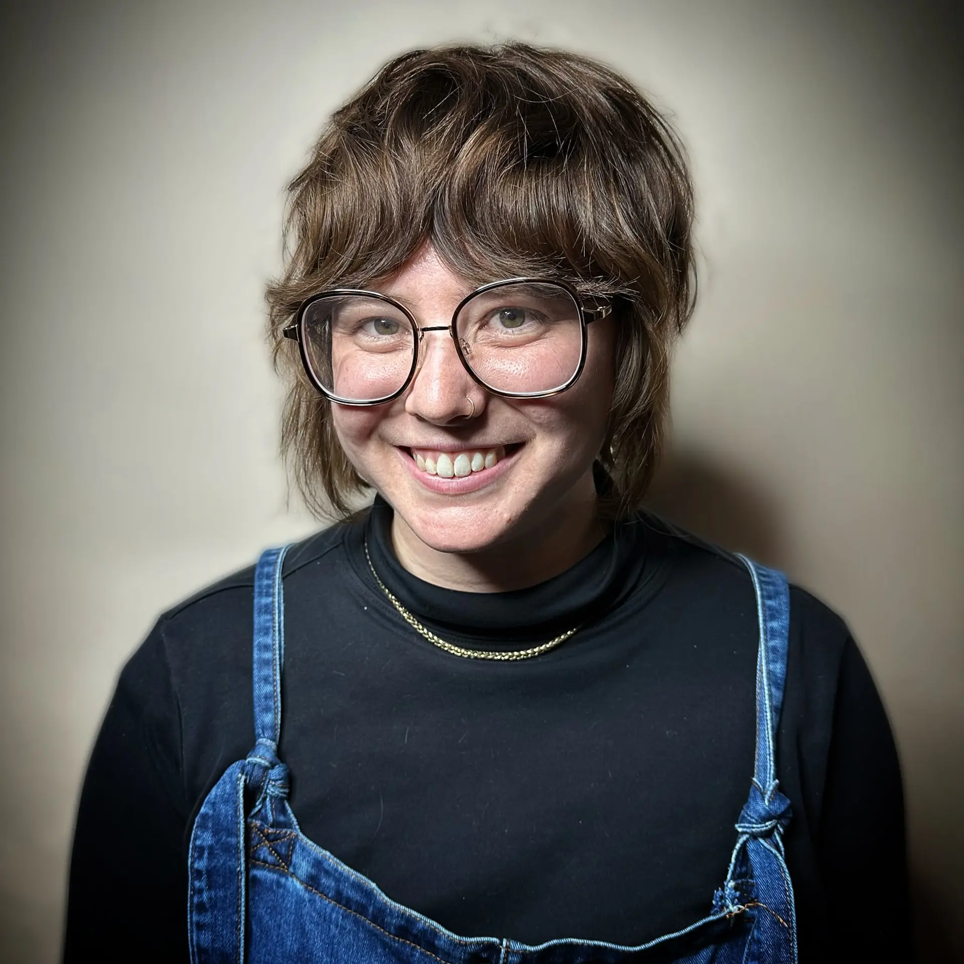 A textured shaggy bixie haircut with piecey bangs and soft, face-framing layers. 1