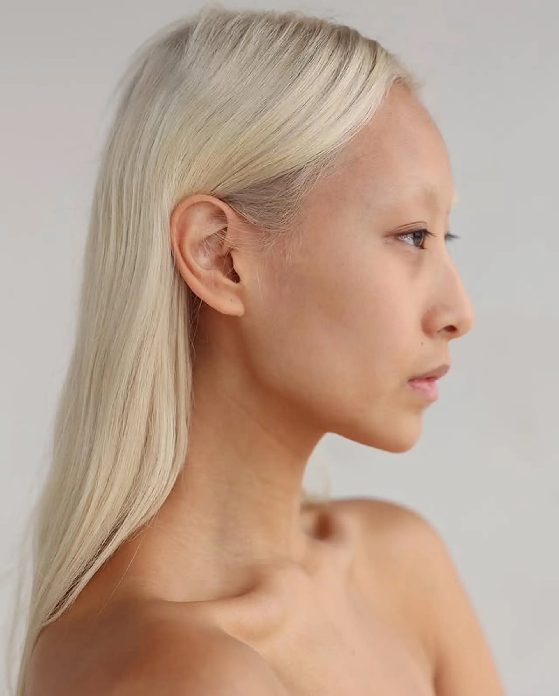 Long, straight hair in an icy blonde color. 1