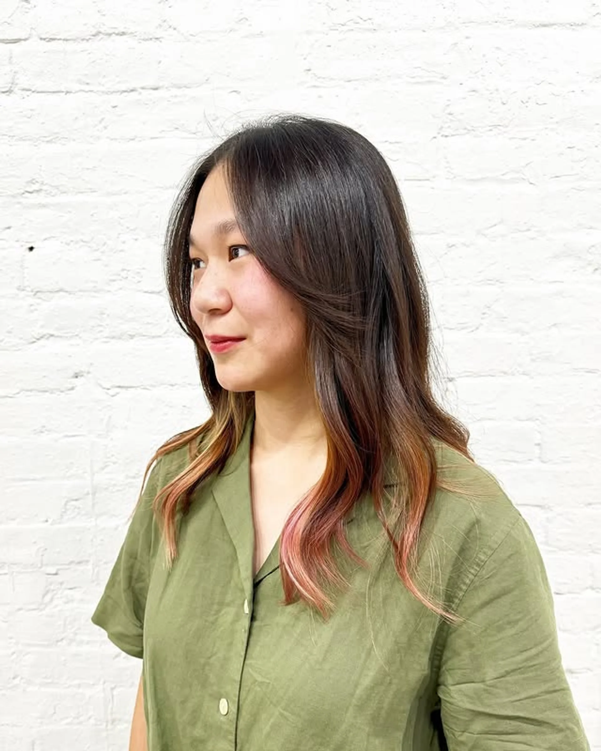 Long wavy hair styled with bold caramel ribbon highlights layered over a dark brunette base - Preview 2