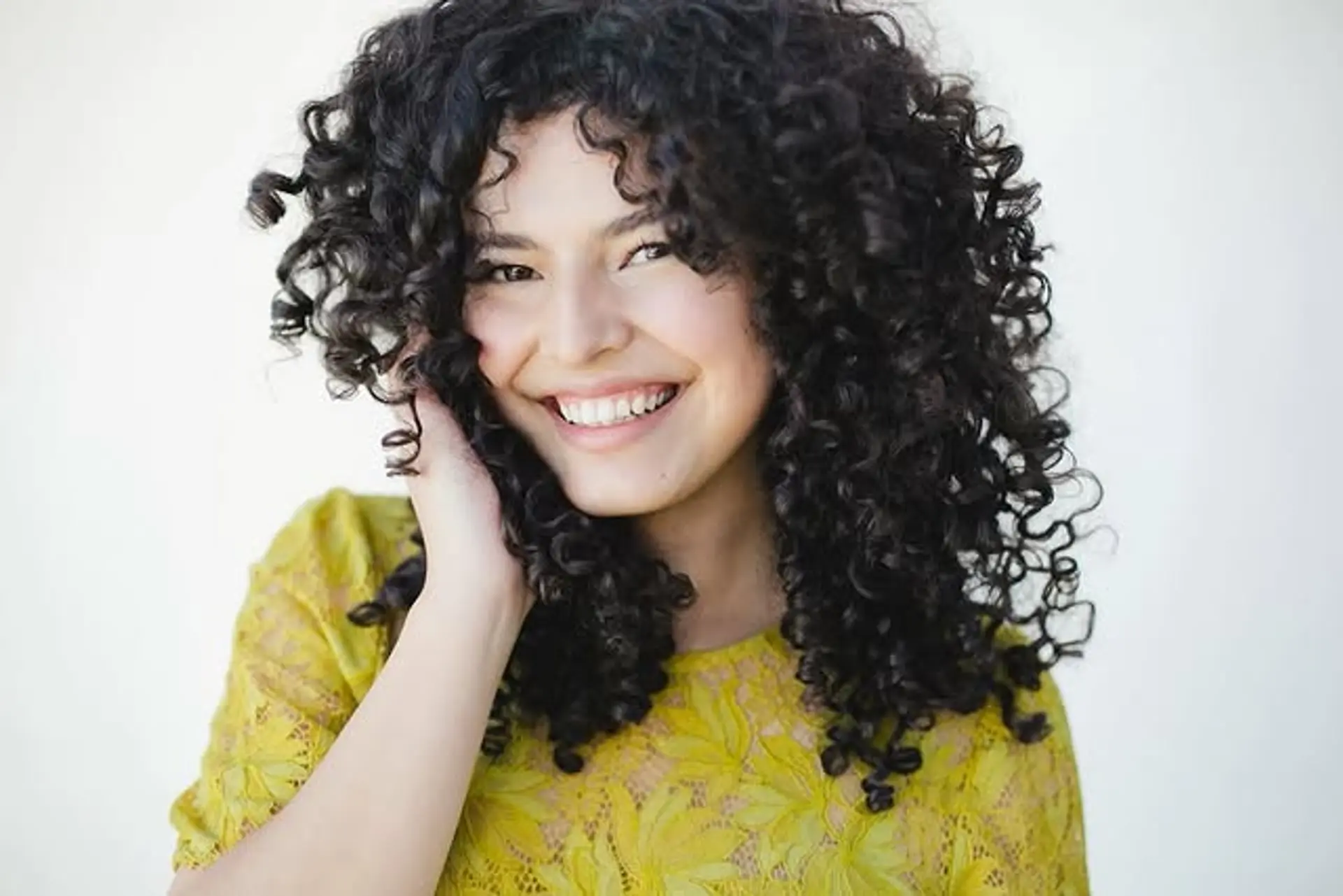 A gorgeous voluminous curly hairstyle. 1