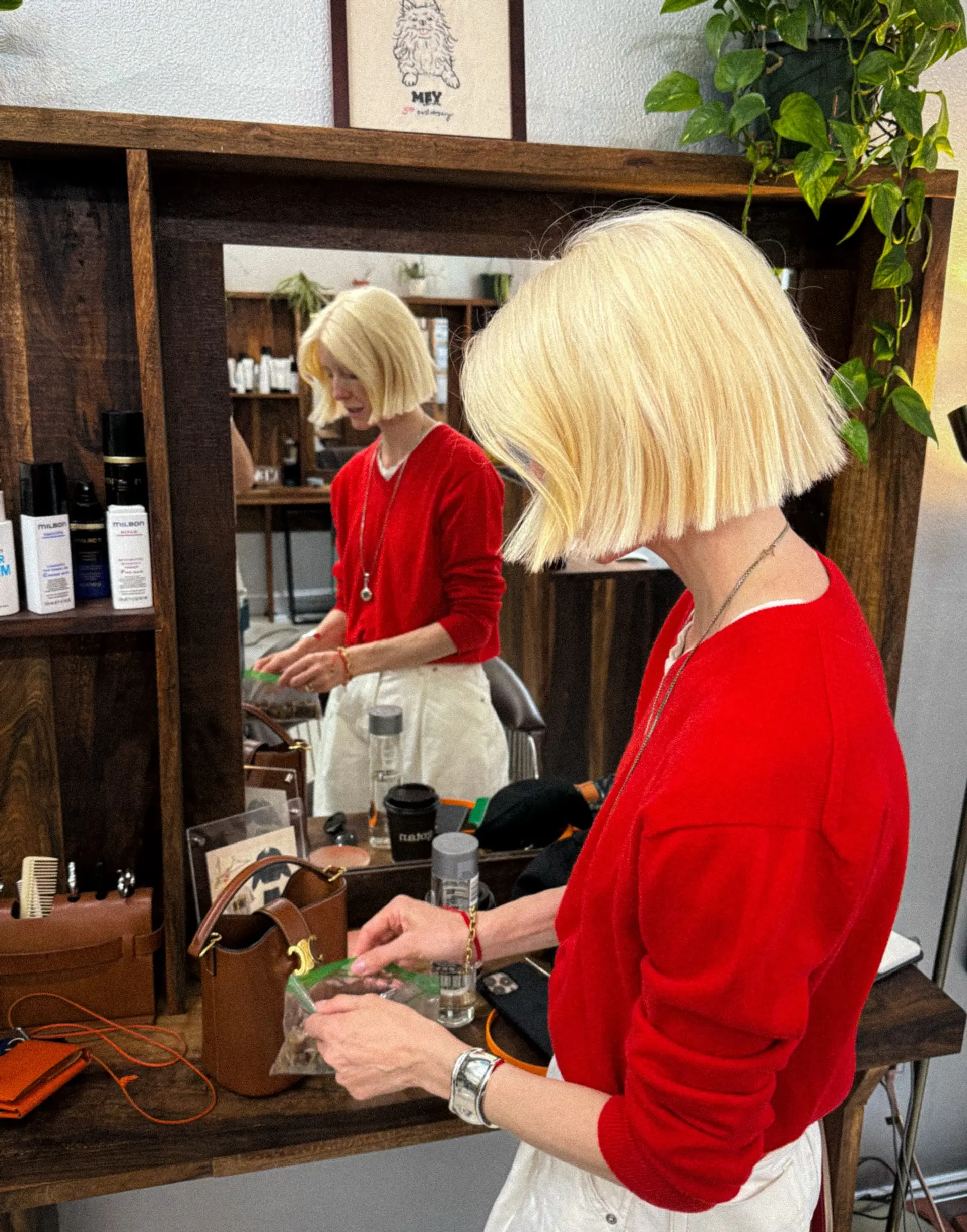 A platinum blonde, blunt cut bob that exudes chic and edgy vibes. 4