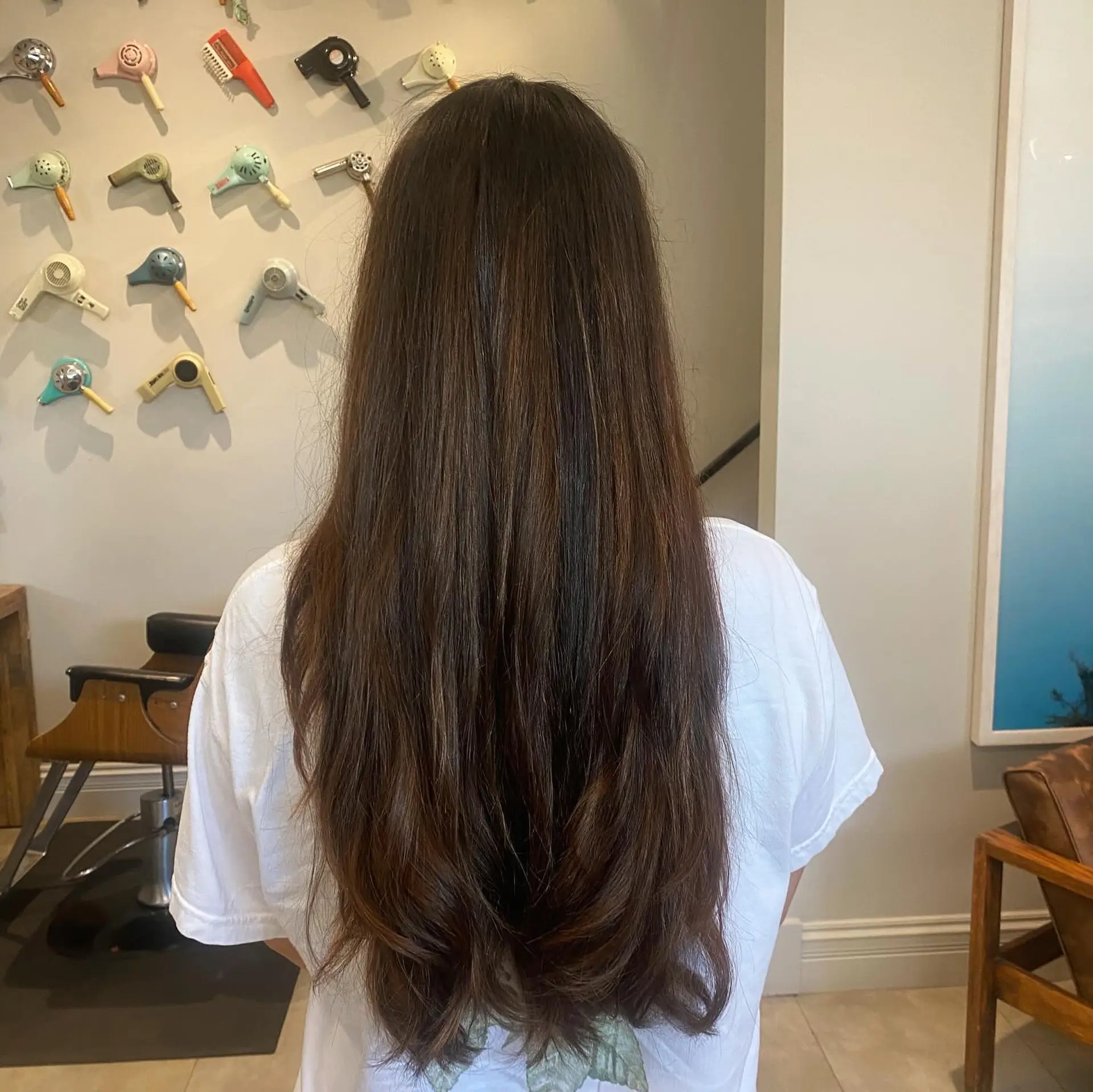 Long, straight hair with layers. 3