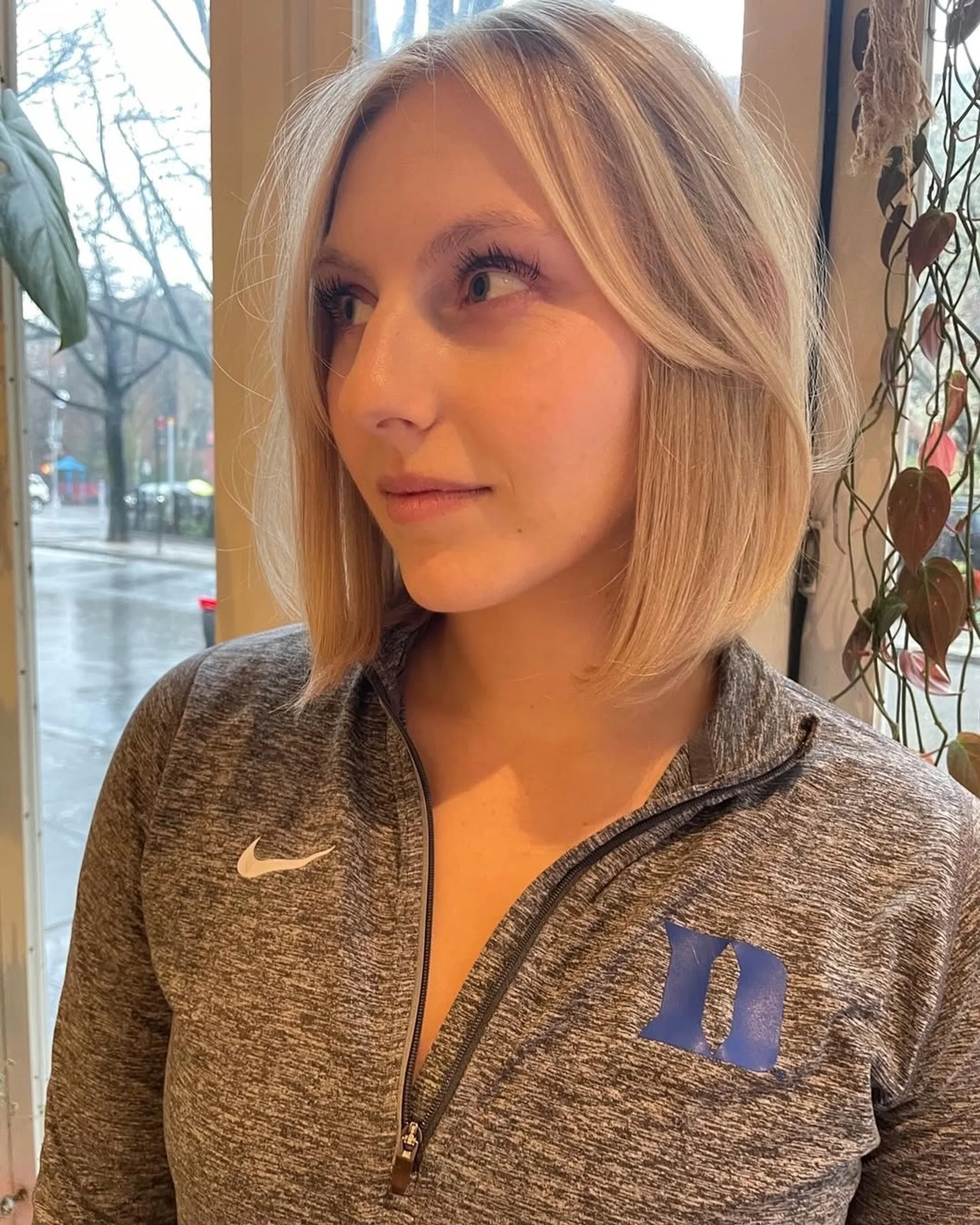A sophisticated blunt bob demonstrating the highly reflective liquid contour trend - Preview 1