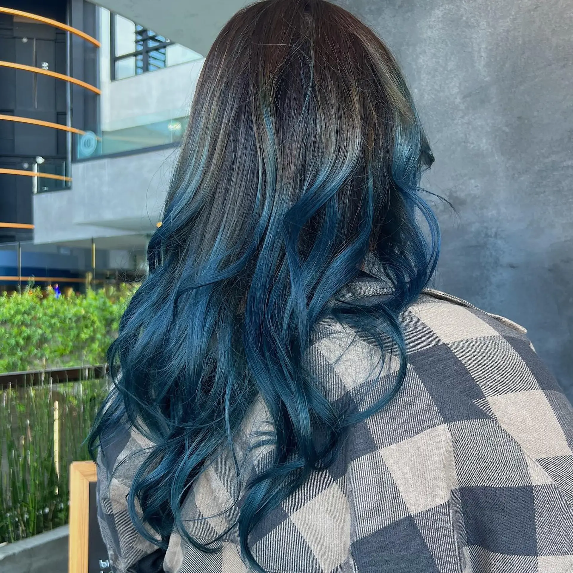 Long layered hair featuring an ombre color melt. 2