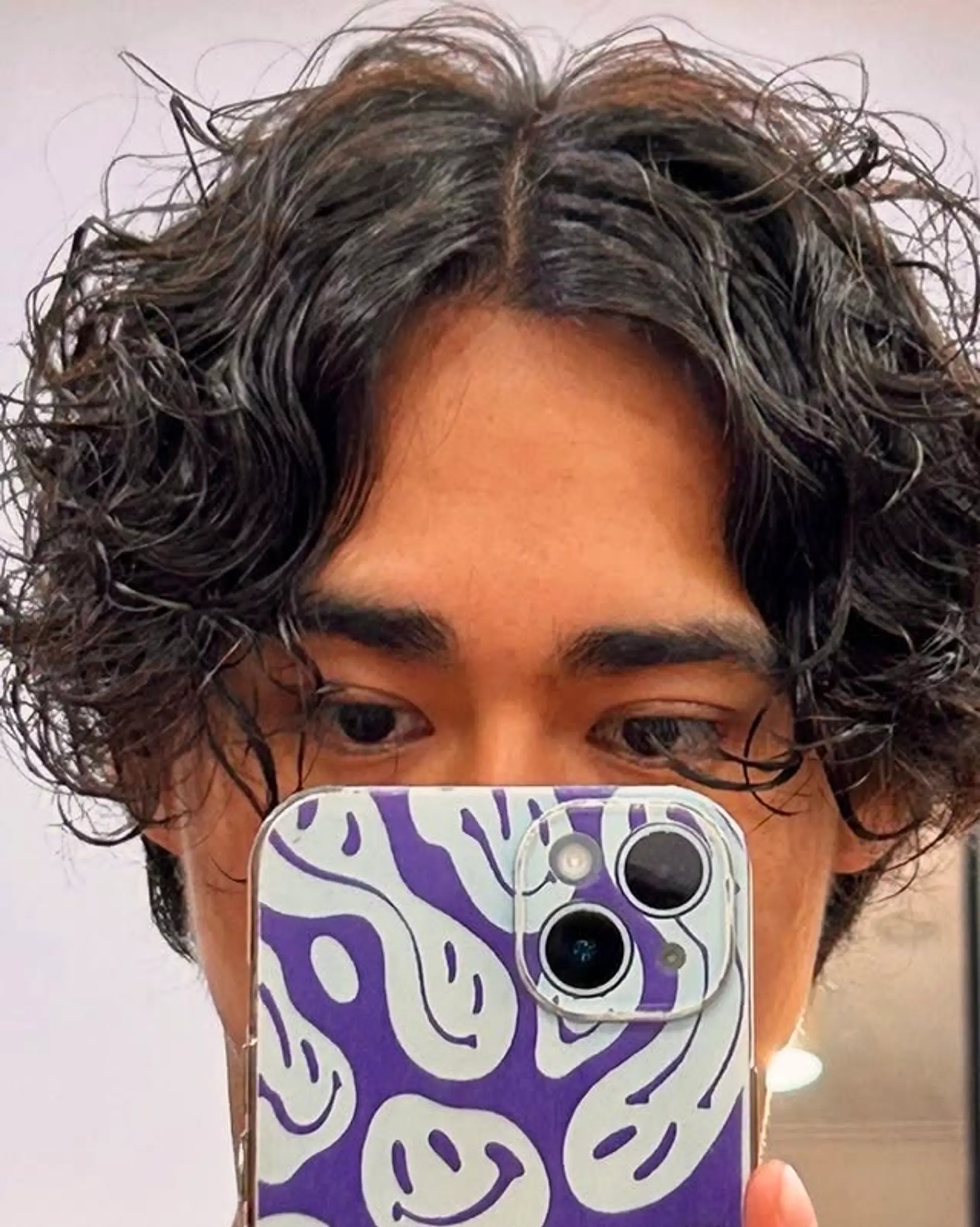 This is a textured wavy mullet. 1