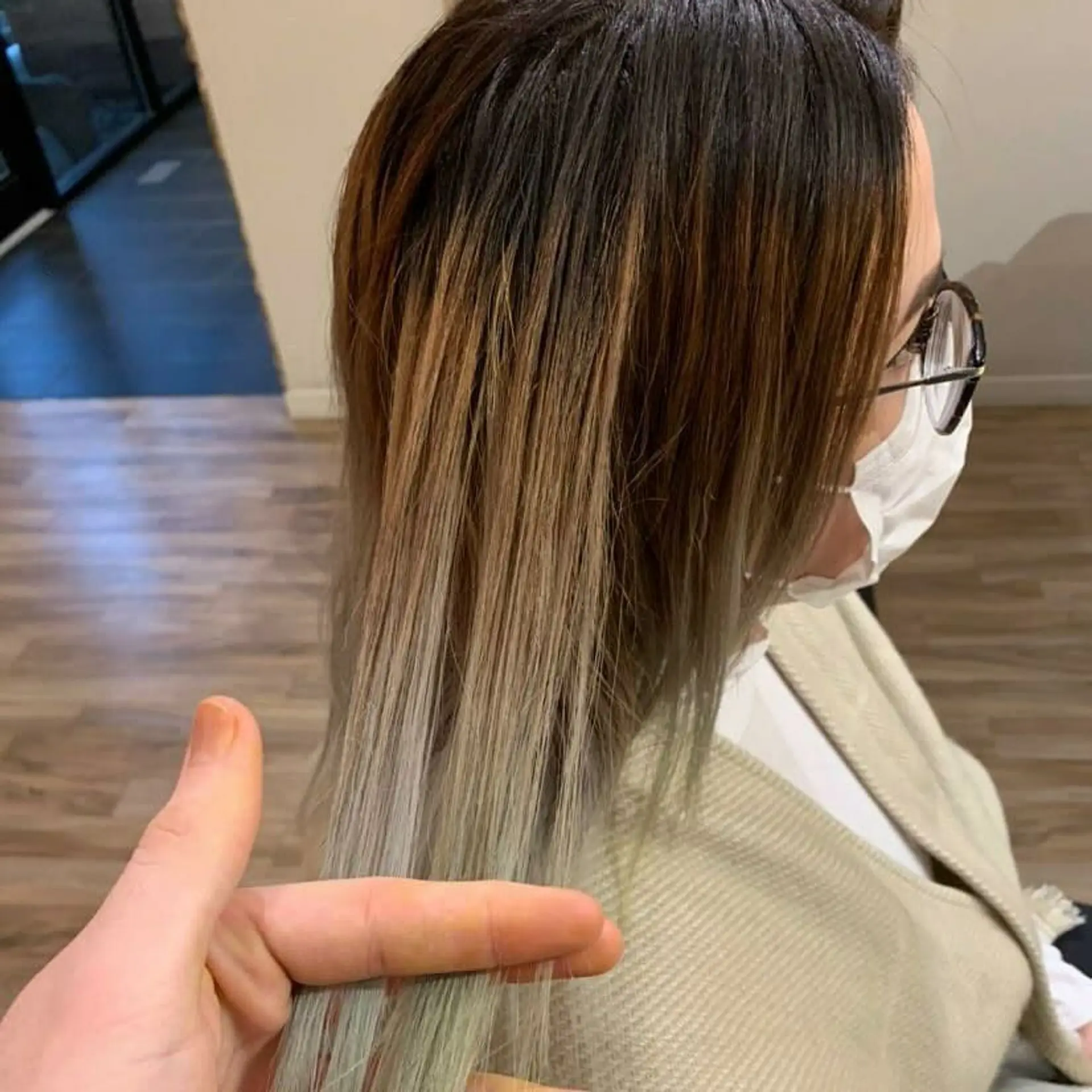 A vivid ombre style that fades from dark roots to electric blue tips. 3