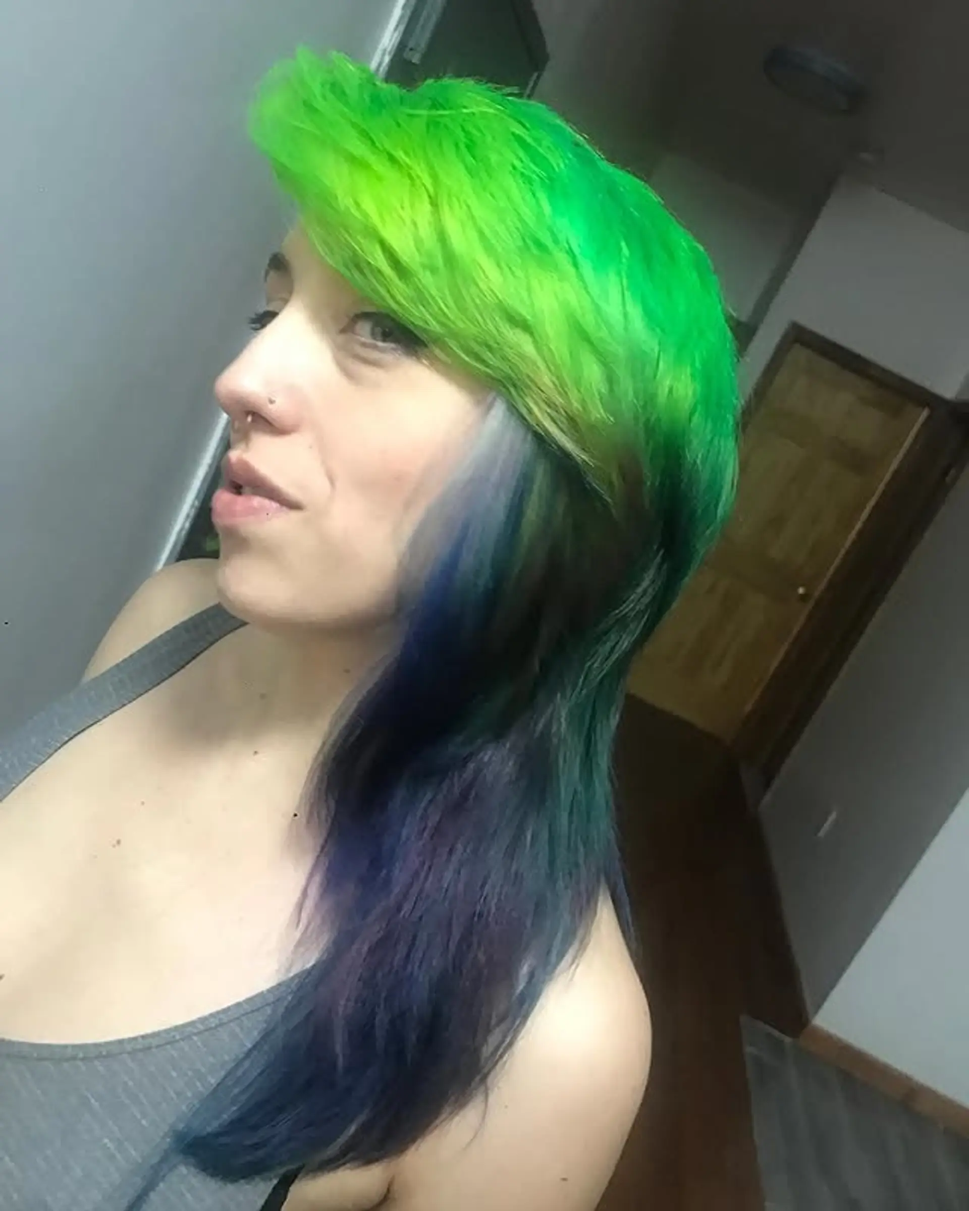 A vibrant and edgy mullet with a two-tone color melt effect. 1