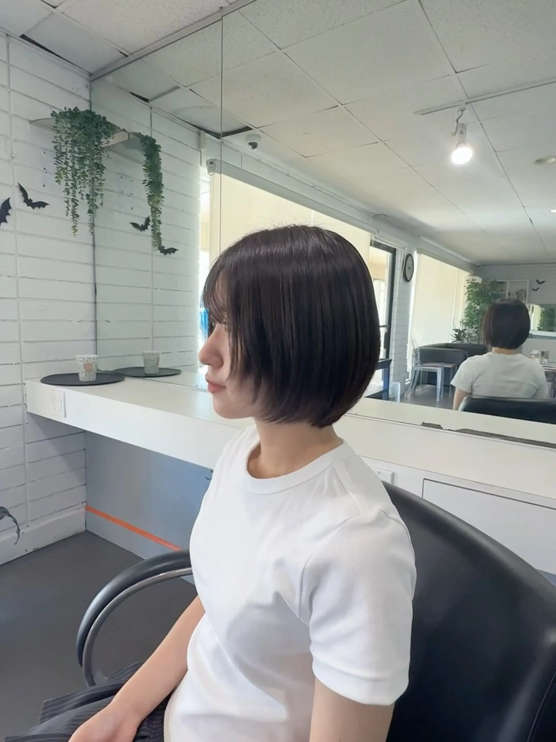 A soft rounded short bob cut with gentle curve inwards and delicate face-framing layers. 1