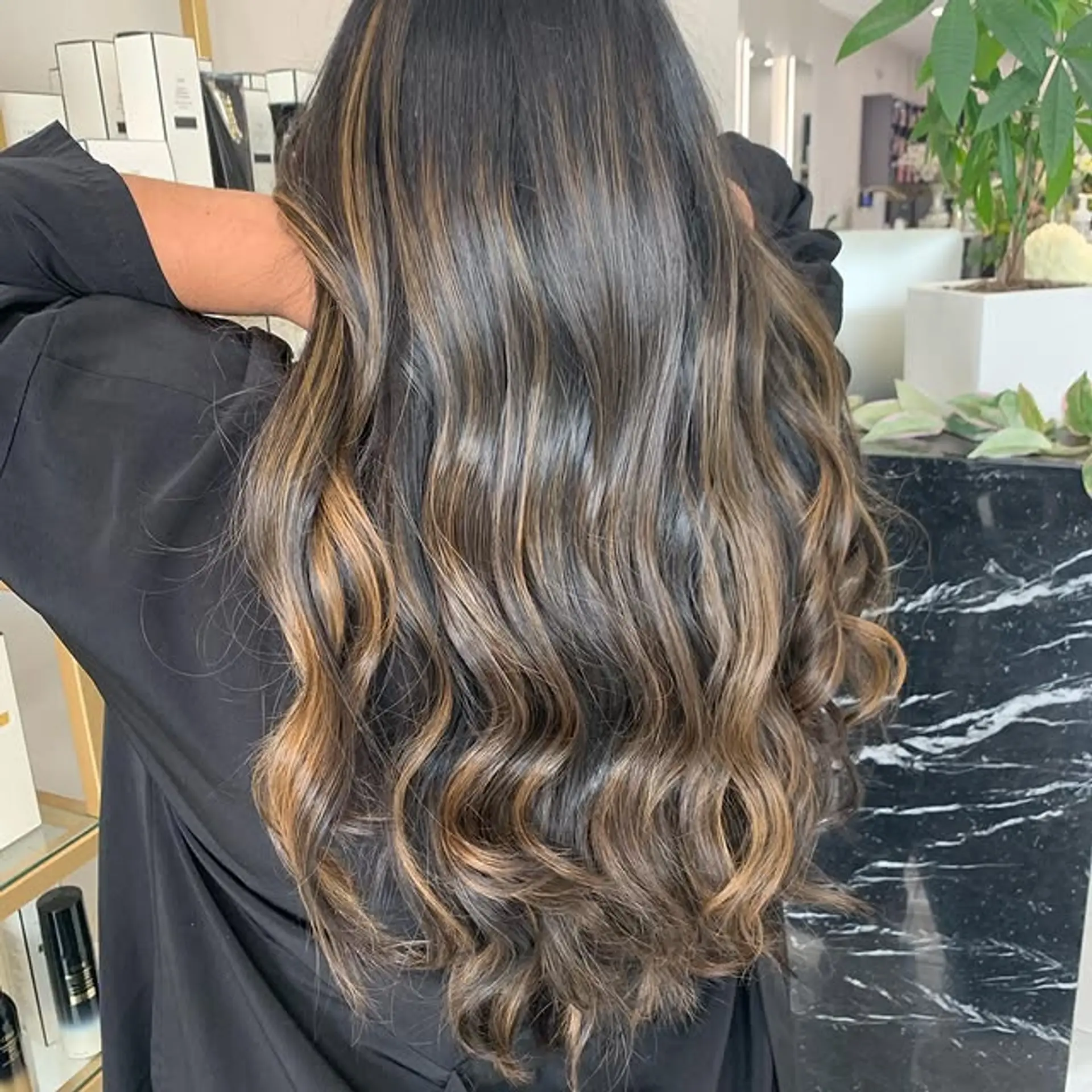 Long, wavy hair with balayage highlights. 1