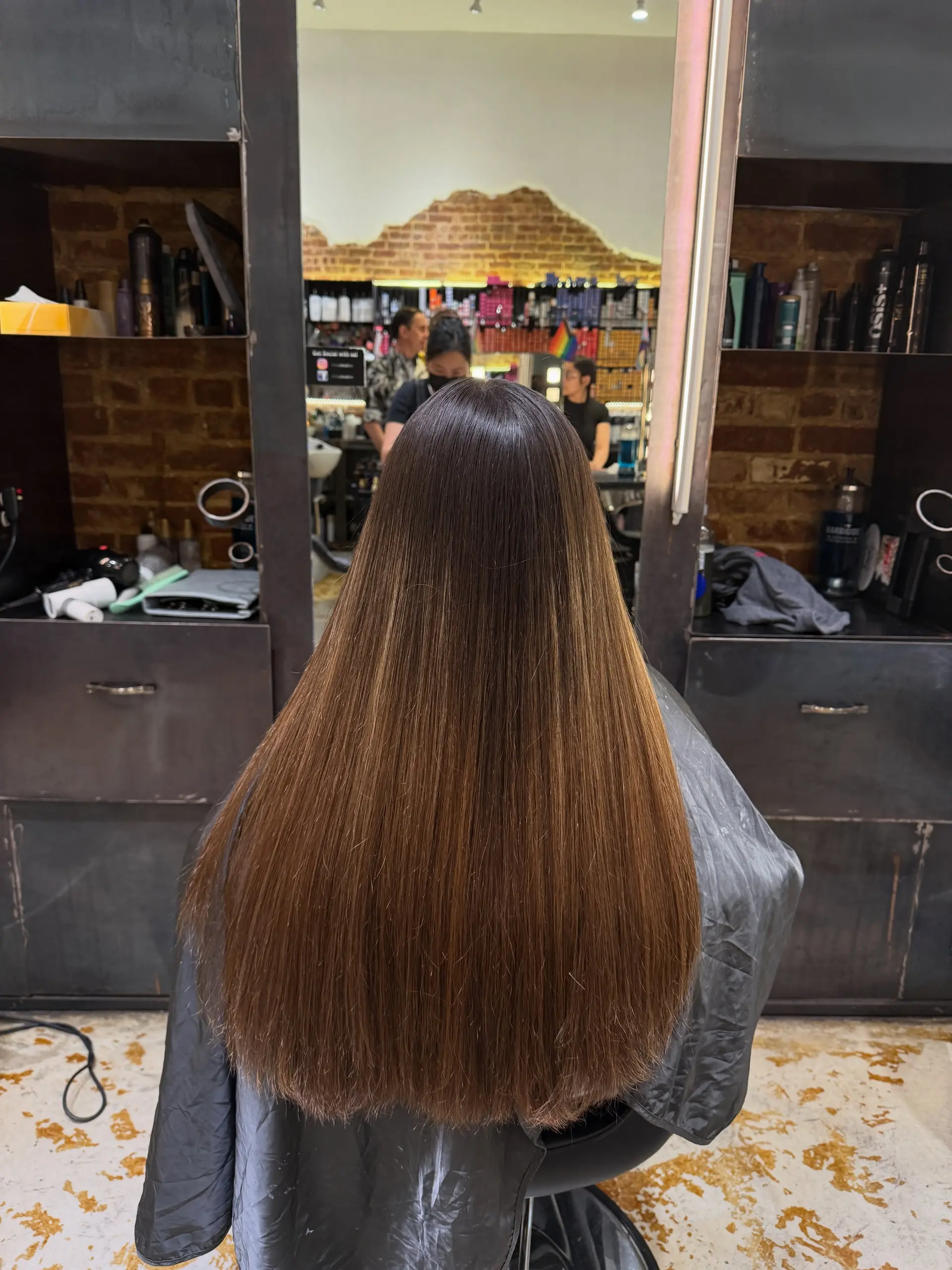 A seamless mushroom brunette color melt with natural depth. 1