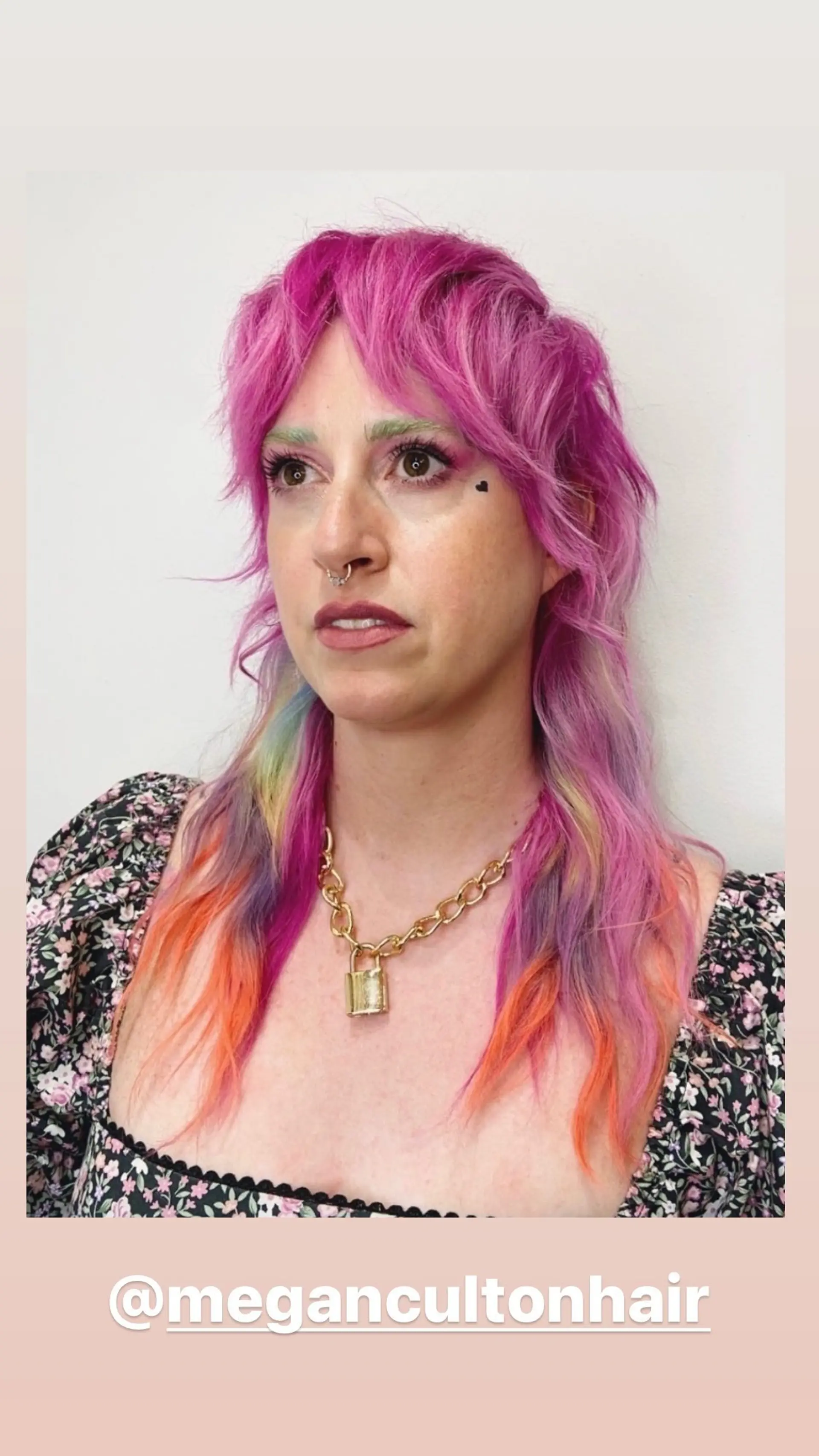 A vibrant mullet with a playful blend of pastel colors and bangs. 1