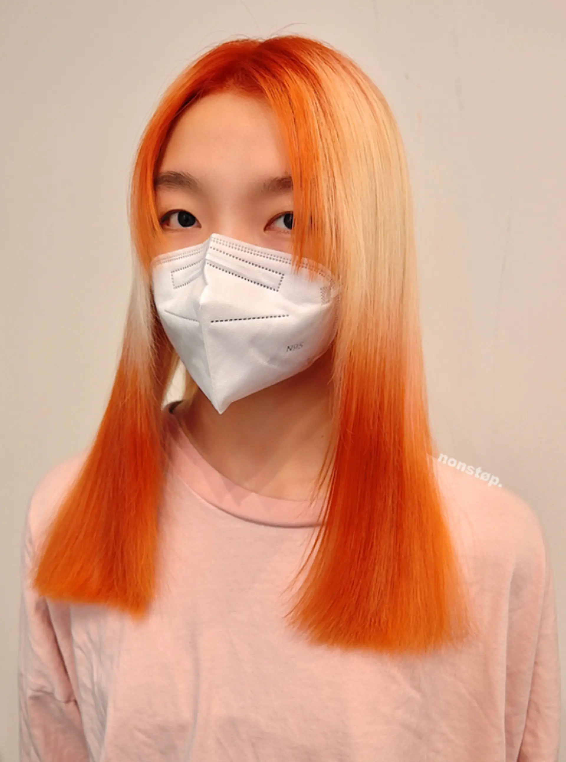 Long, straight hair with vibrant orange roots fading into a light blonde towards the tips, parted in the middle with sleek, symmetrical locks.
(NonstopStyle: by Vincent) 1