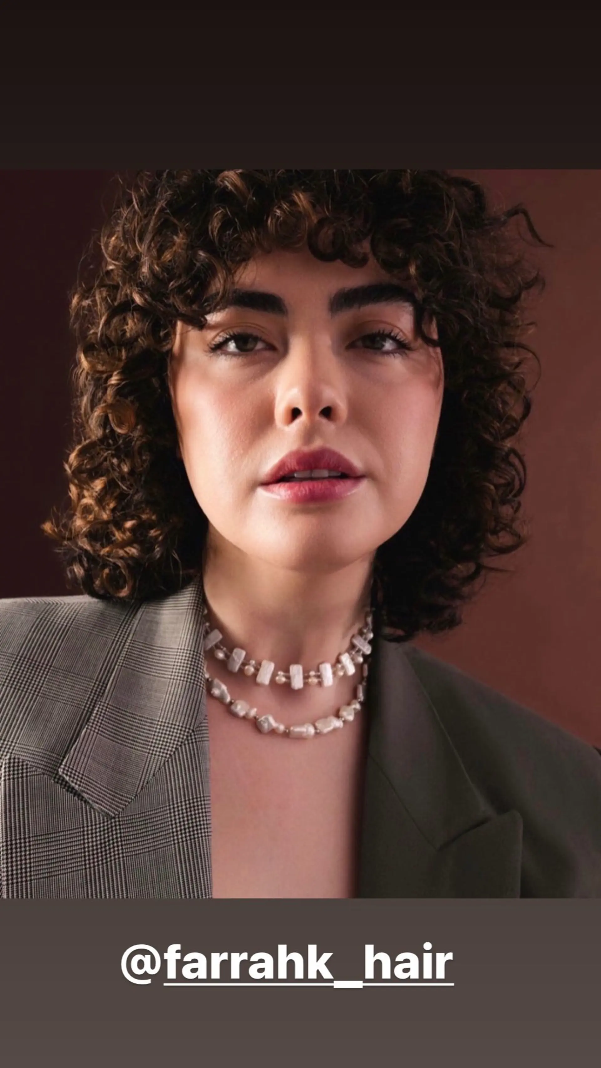 A curly shag with full bangs and layered texture. 1