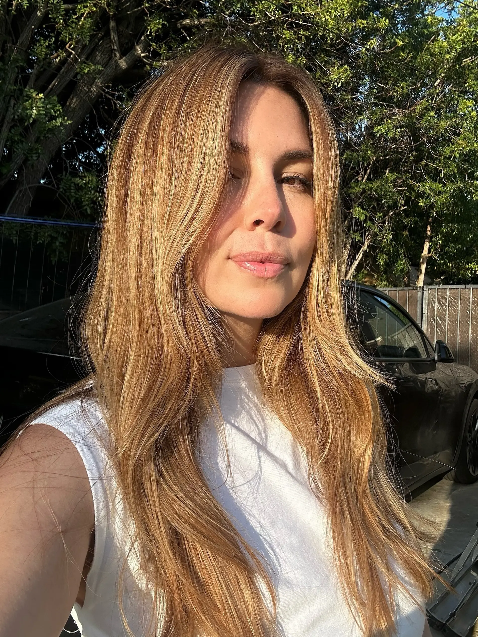Long golden blonde hair with dimensional highlights, styled straight with soft face-framing layers. 1