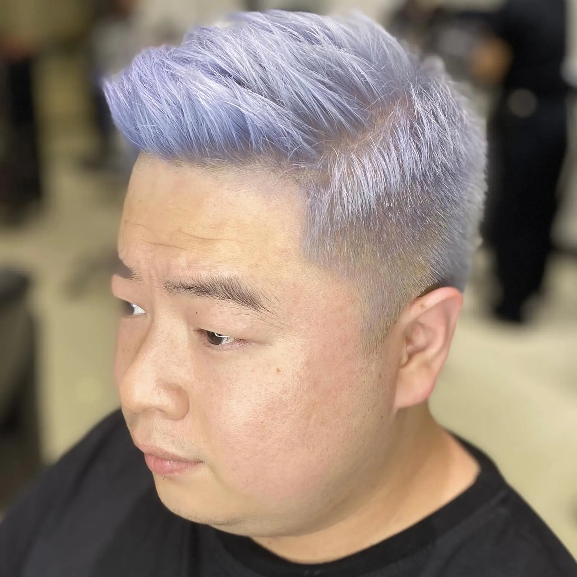 A stylish textured crop with an undercut and fade, colored in an icy lavender. 2