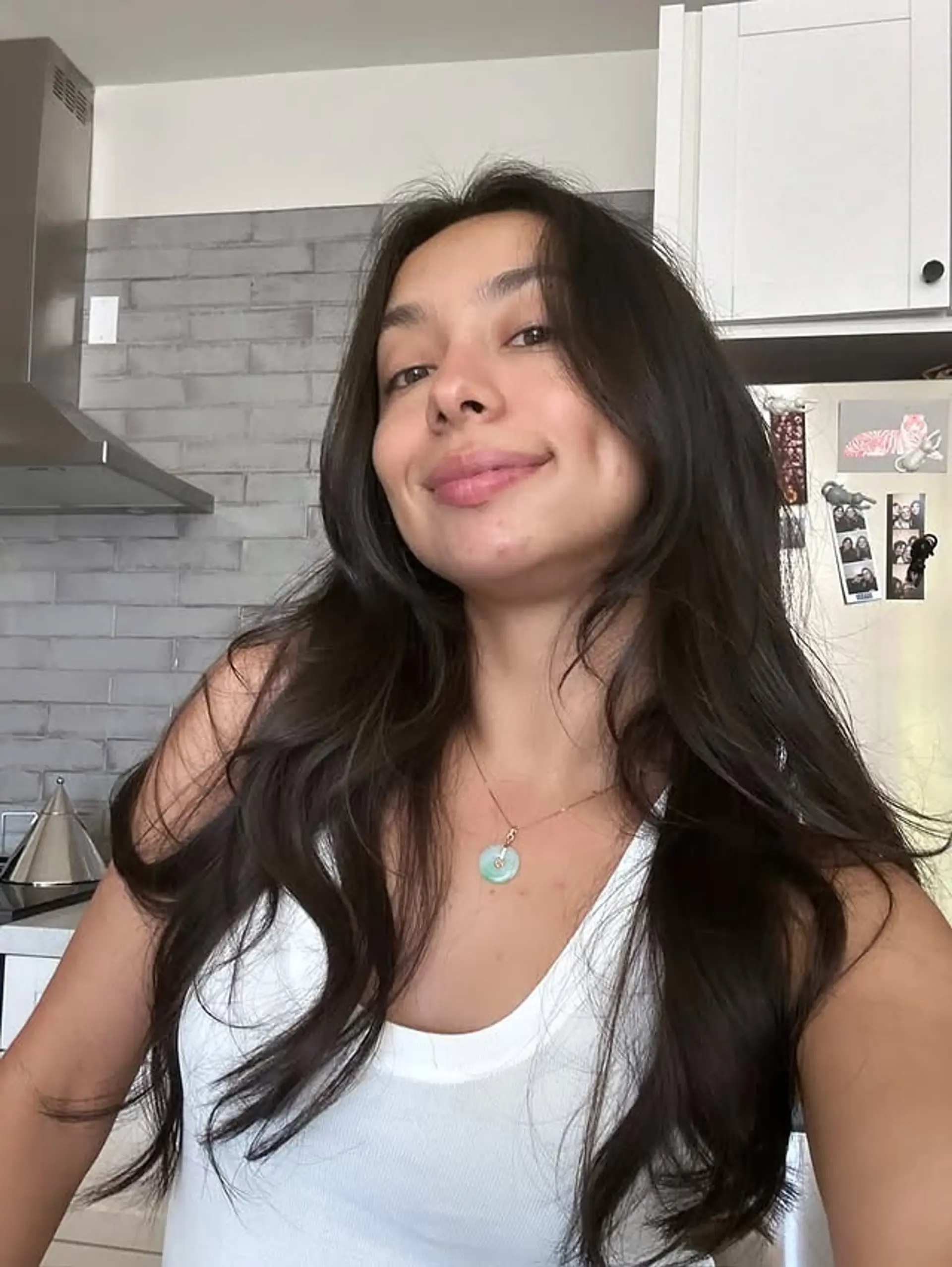 Long, soft waves with face-framing layers for an effortless look. 1