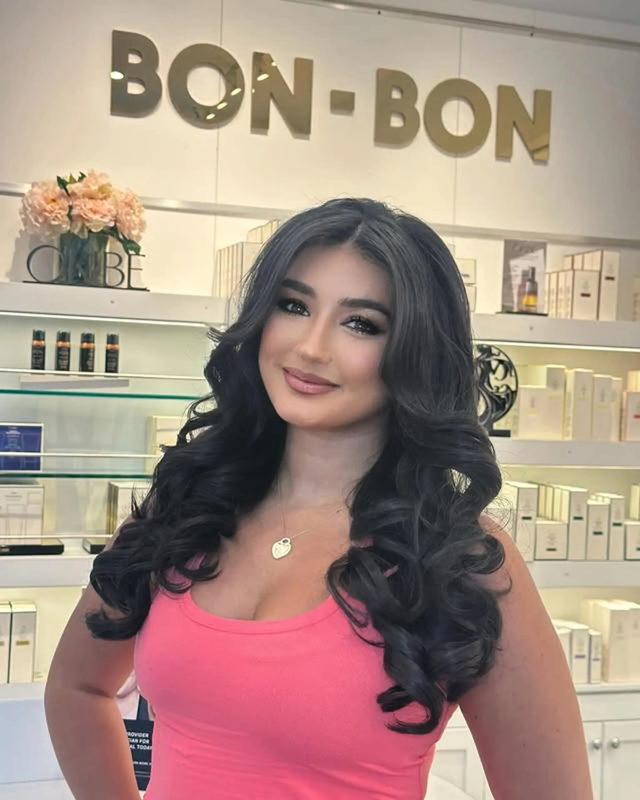 A long, wavy hairstyle with loose, voluminous waves reminiscent of old Hollywood glamour.