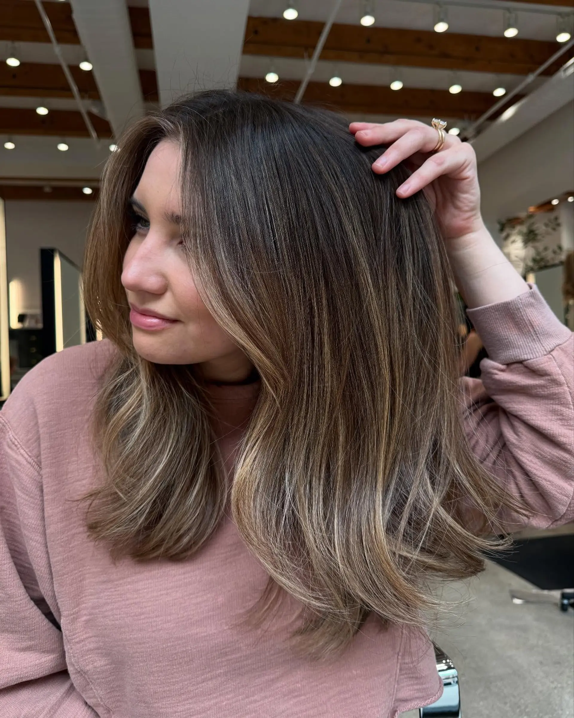 A layered, medium-length cut with a bronde balayage. 1