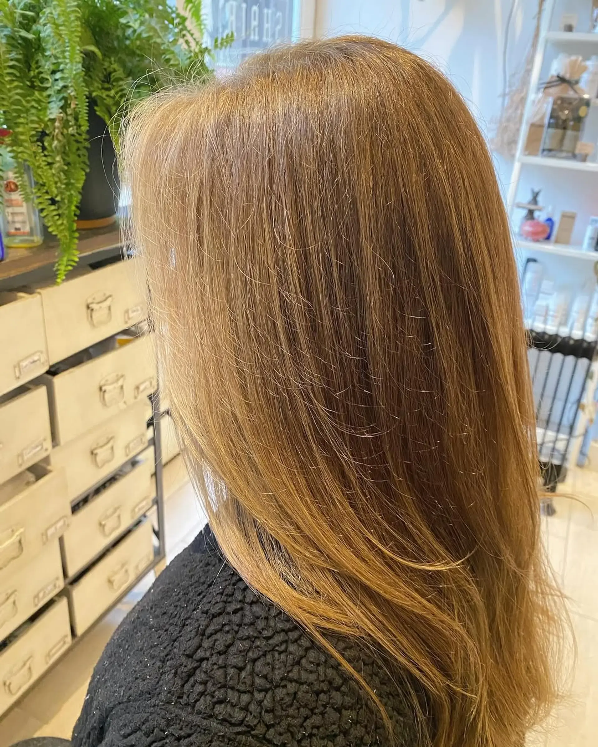 A classic medium-length hairstyle with face-framing layers. 1