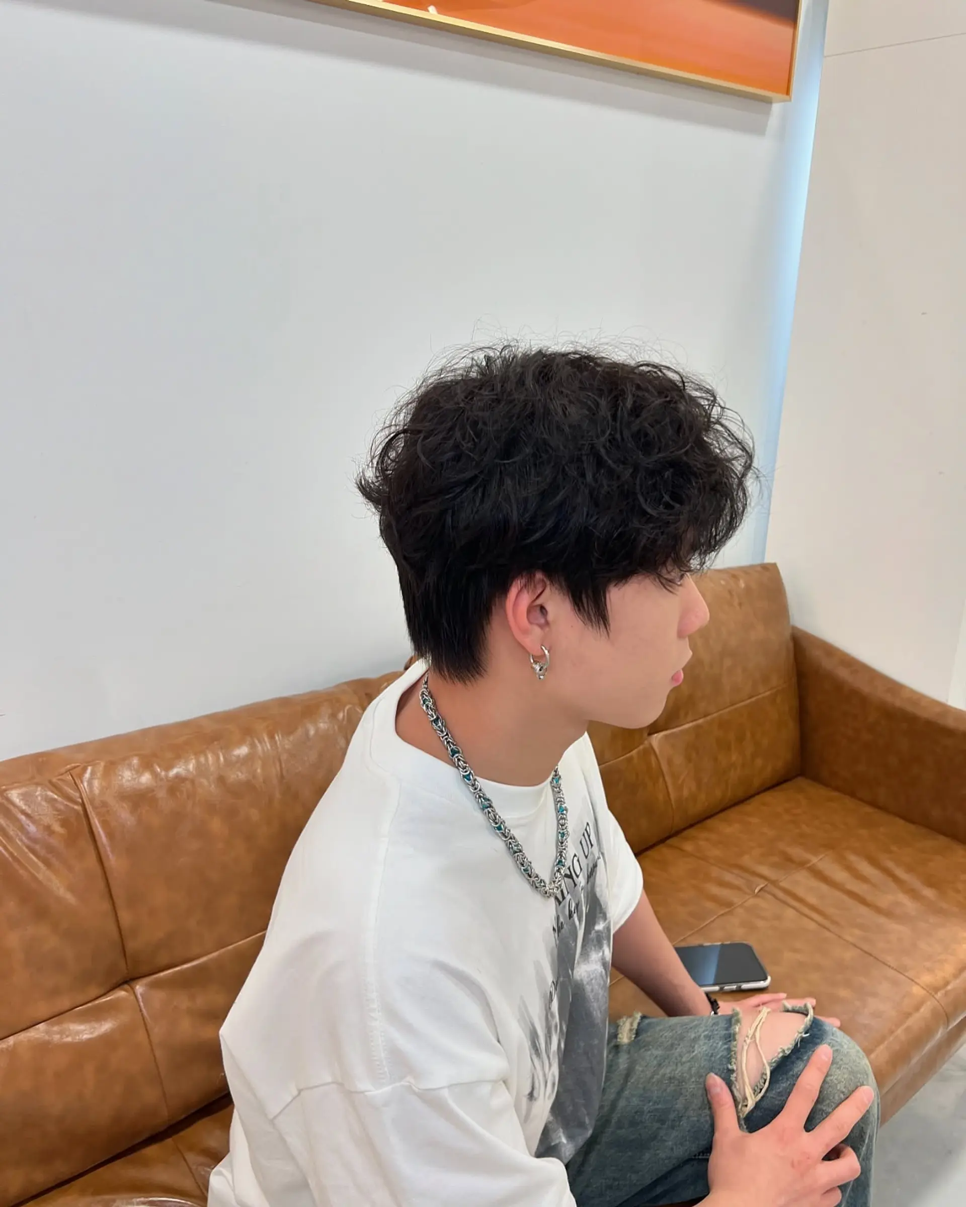 A textured Korean perm with soft, voluminous curls. 1