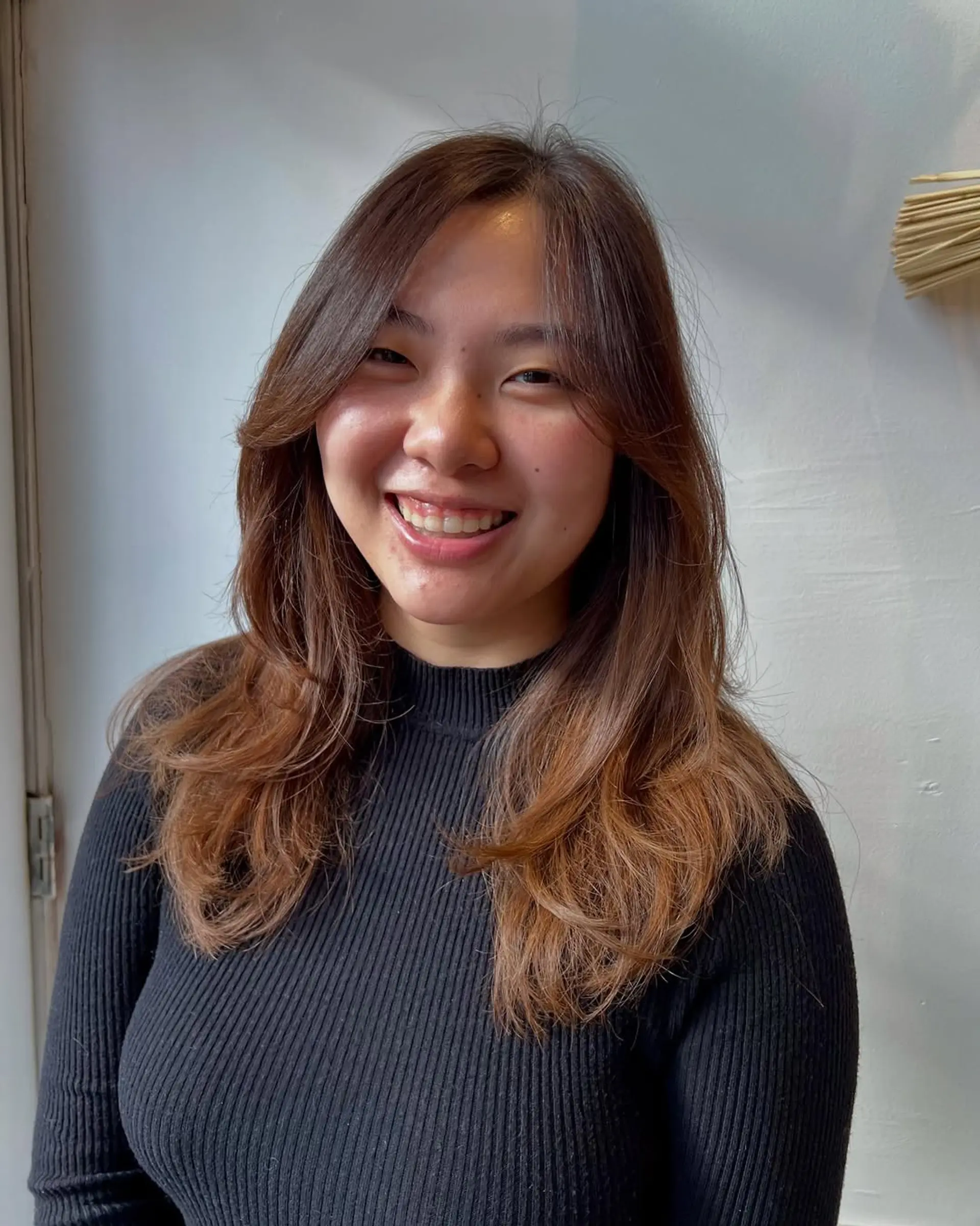 Long layered waves with a bronzed balayage. 3