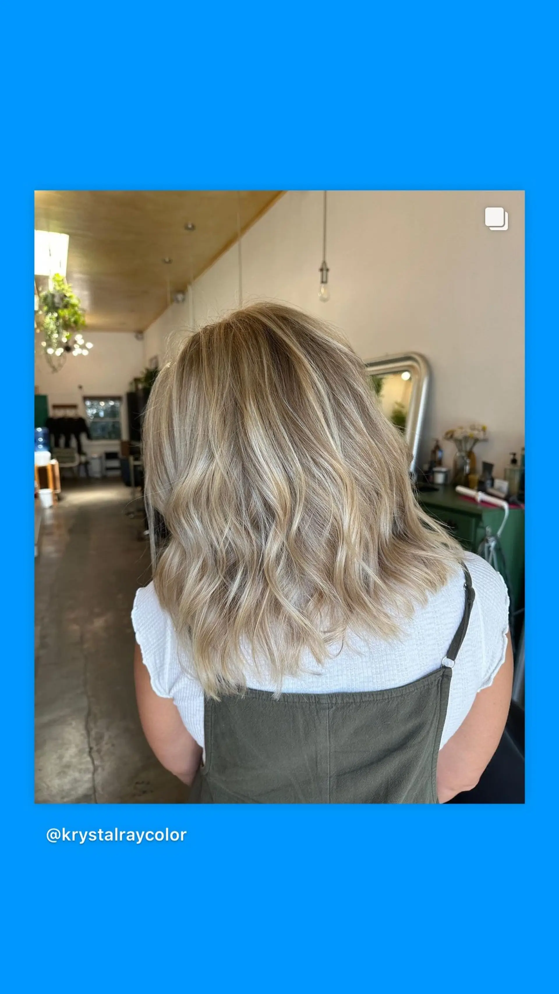 A medium-length wavy lob with a blonde balayage. 1